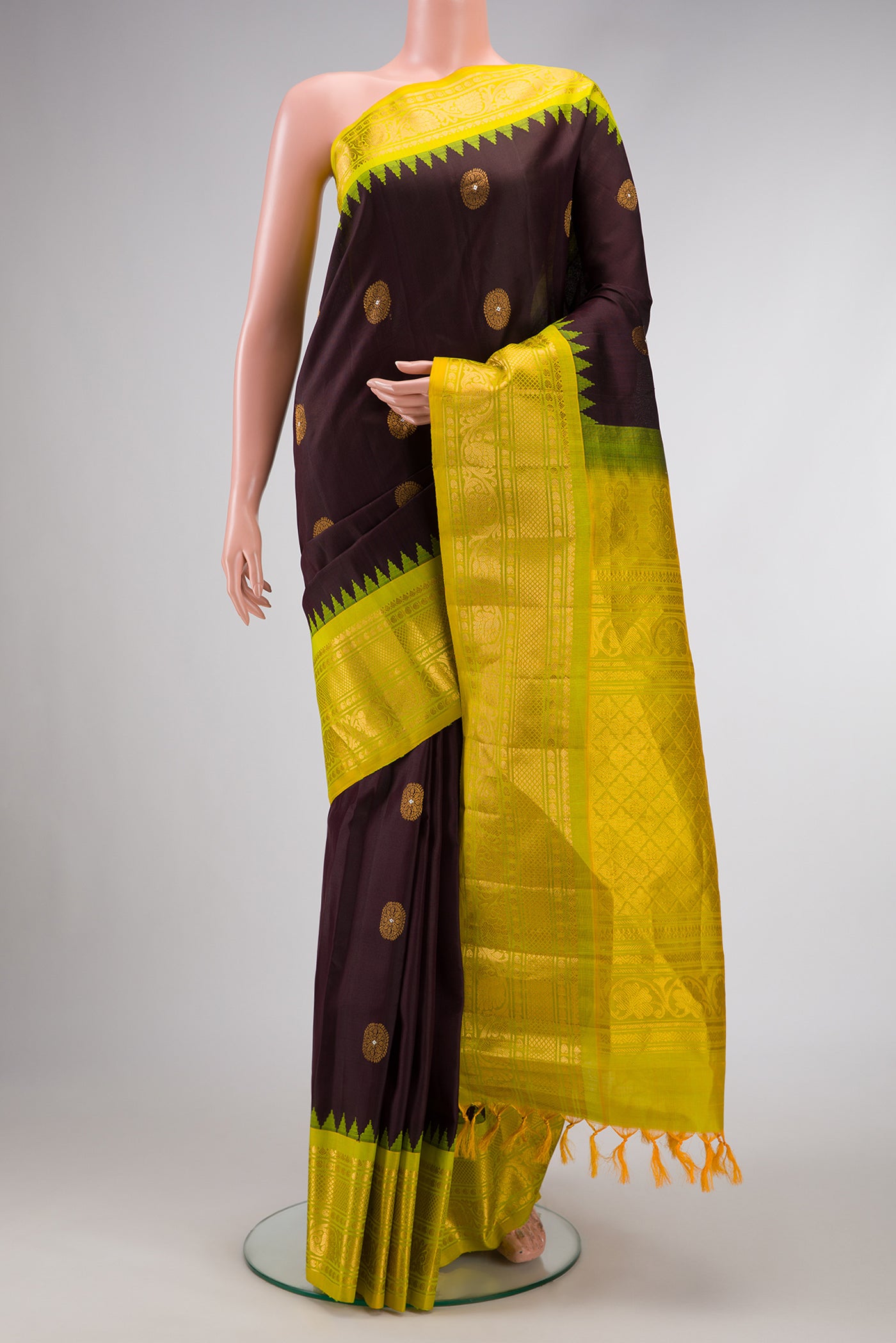 Coffee Brown Dual Tone Gadwal Silk Saree with Zari And Thread Butta on the body and Zari Border.  displayed on a mannequin