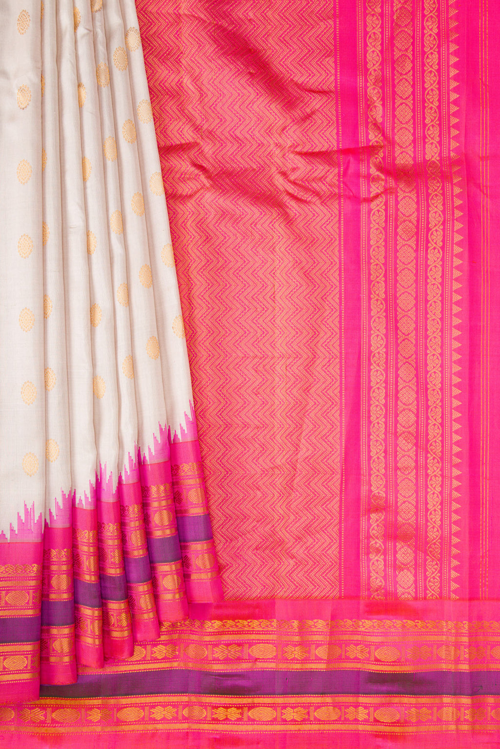 Pleats and pallu of Beige Dual Tone Gadwal Silk Saree with Zari Butta on the body and Zari Border. 