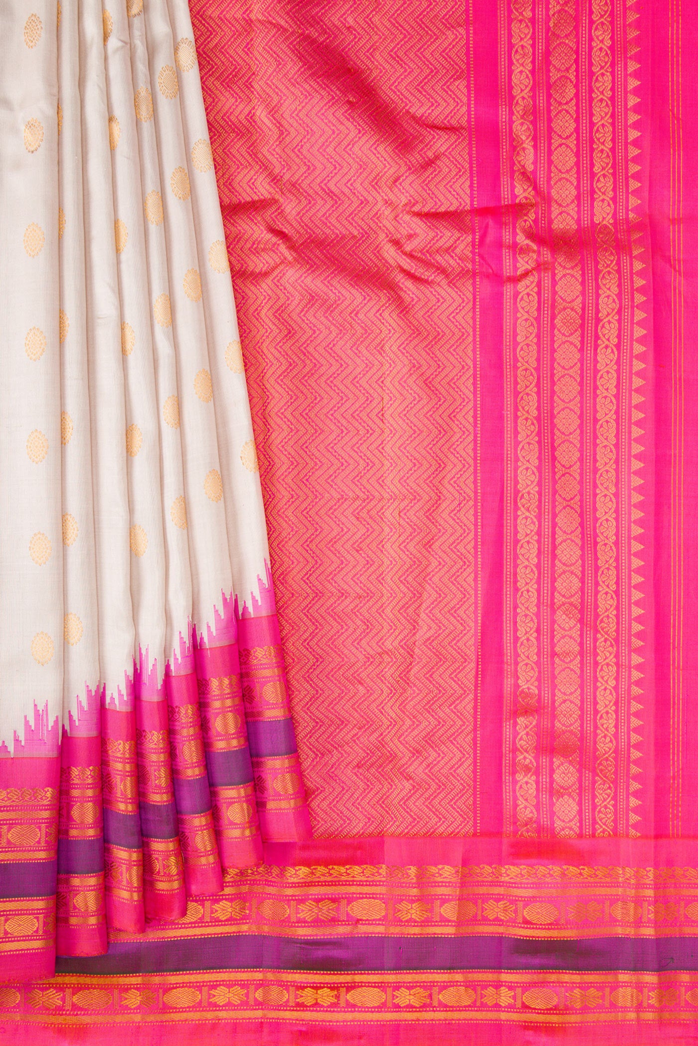 Pleats and pallu of Beige Dual Tone Gadwal Silk Saree with Zari Butta on the body and Zari Border. 