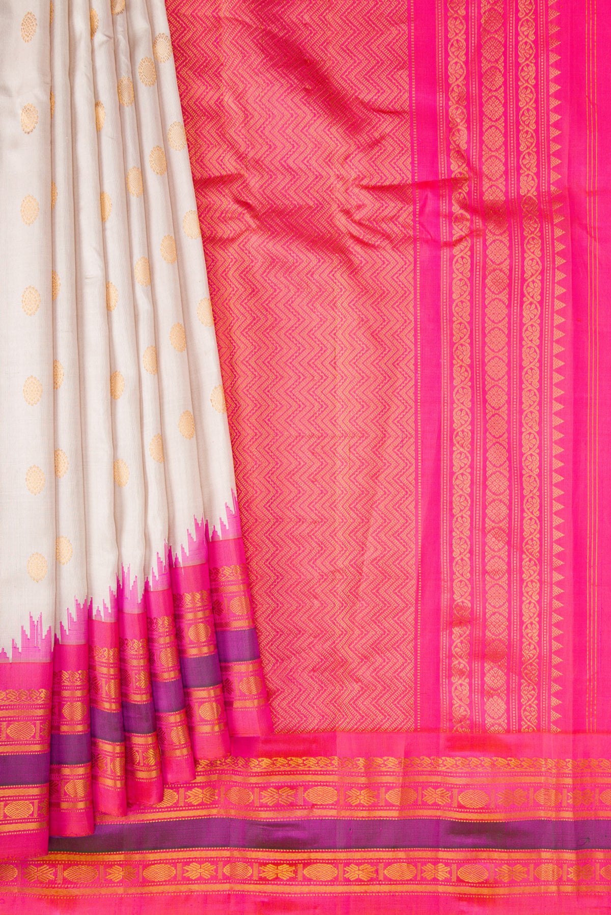 Pleats and pallu of Beige Dual Tone Gadwal Silk Saree with Zari Butta on the body and Zari Border. 