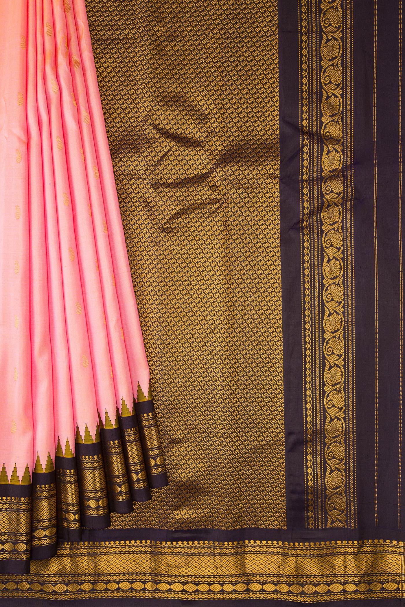 Pleats and pallu of Coral Dual Tone Gadwal Silk Saree with Zari Butta on the body and Zari Border. 