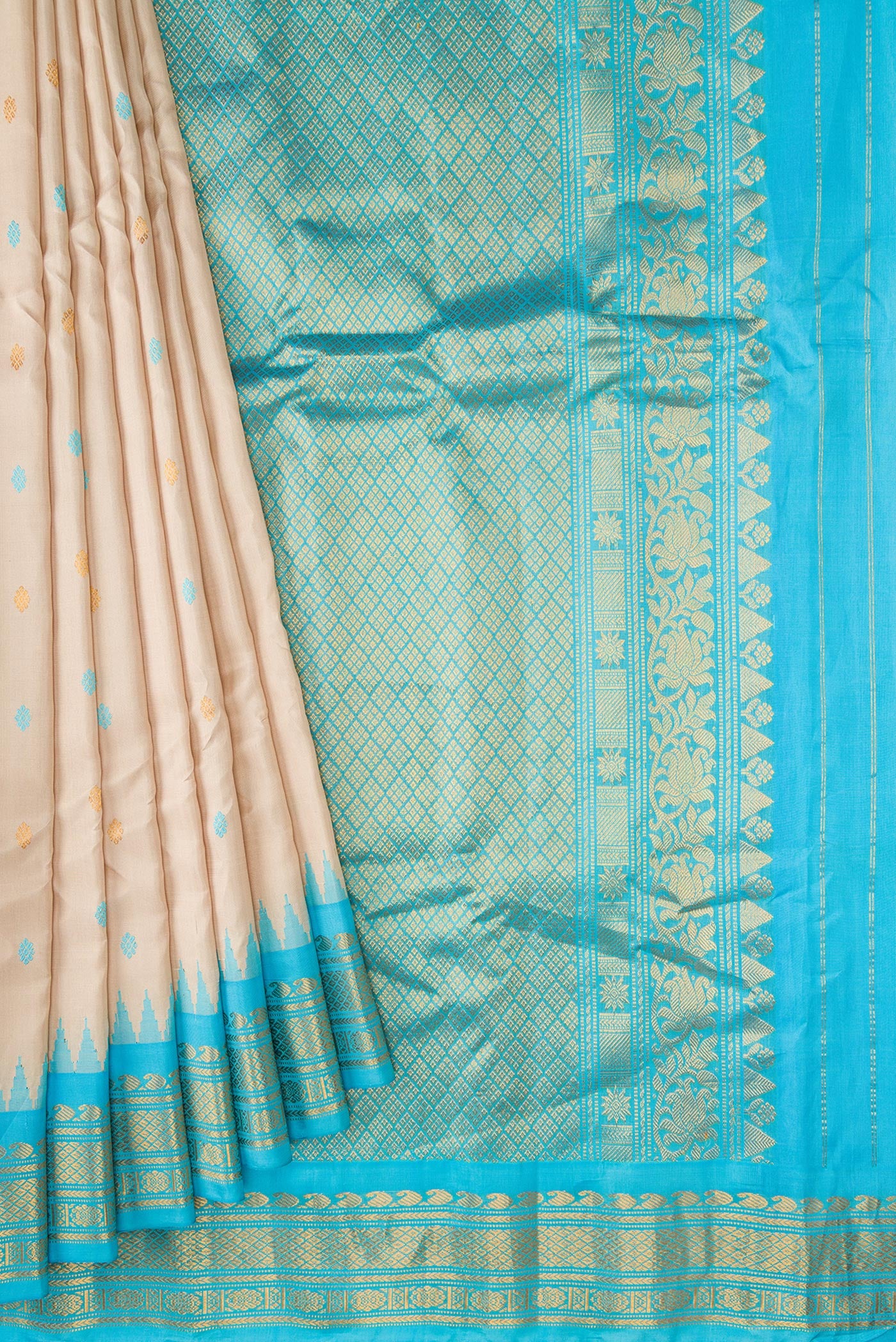 Pleats and pallu of Dark Beige Dual Tone Gadwal Silk Saree with Zari And Thread Butta on the body and Zari Border. 