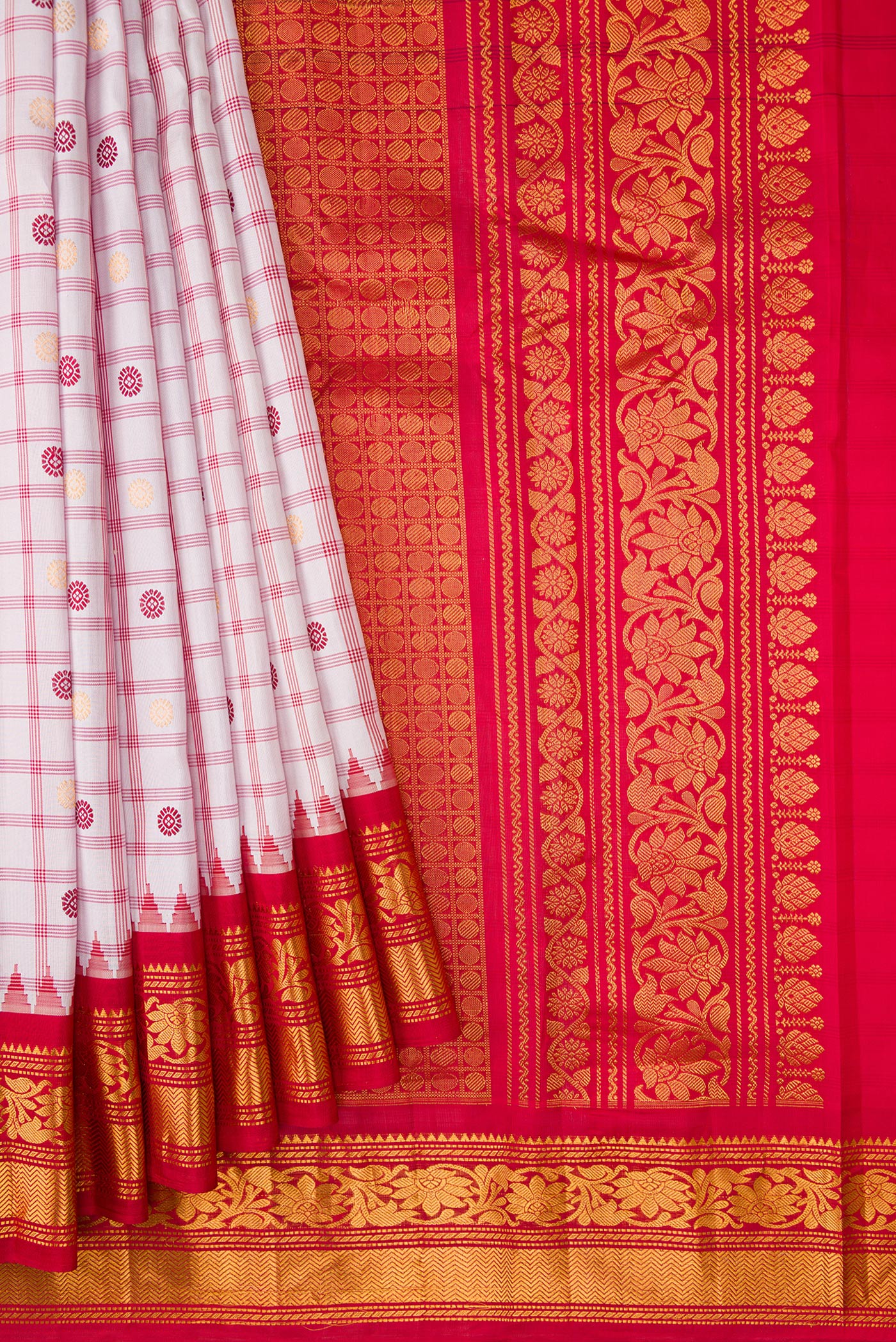 Pleats and pallu of Off White Dual Tone Gadwal Silk Saree with Checked design on the body and Zari Border. 