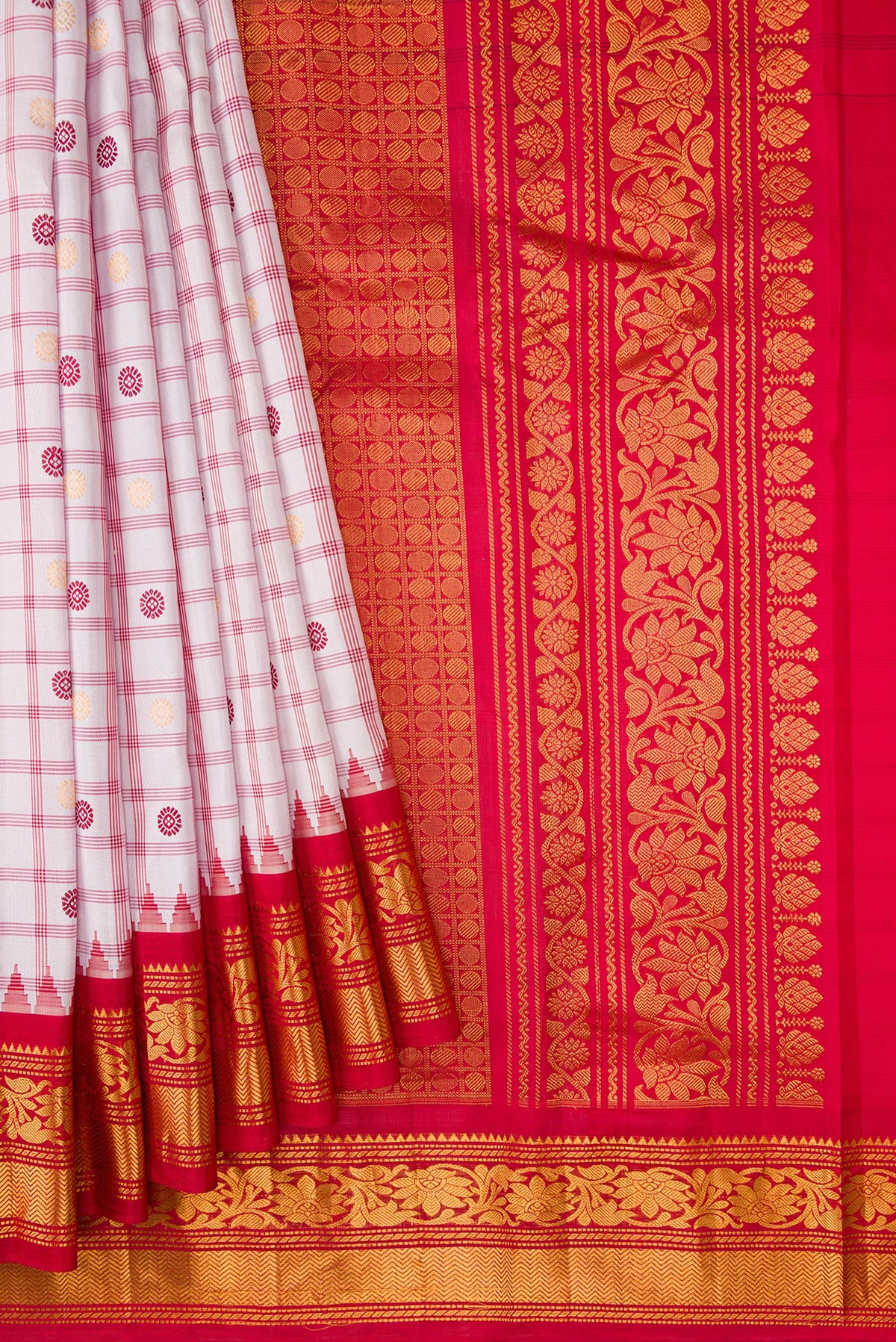 Pleats and pallu of Off White Dual Tone Gadwal Silk Saree with Checked design on the body and Zari Border. 