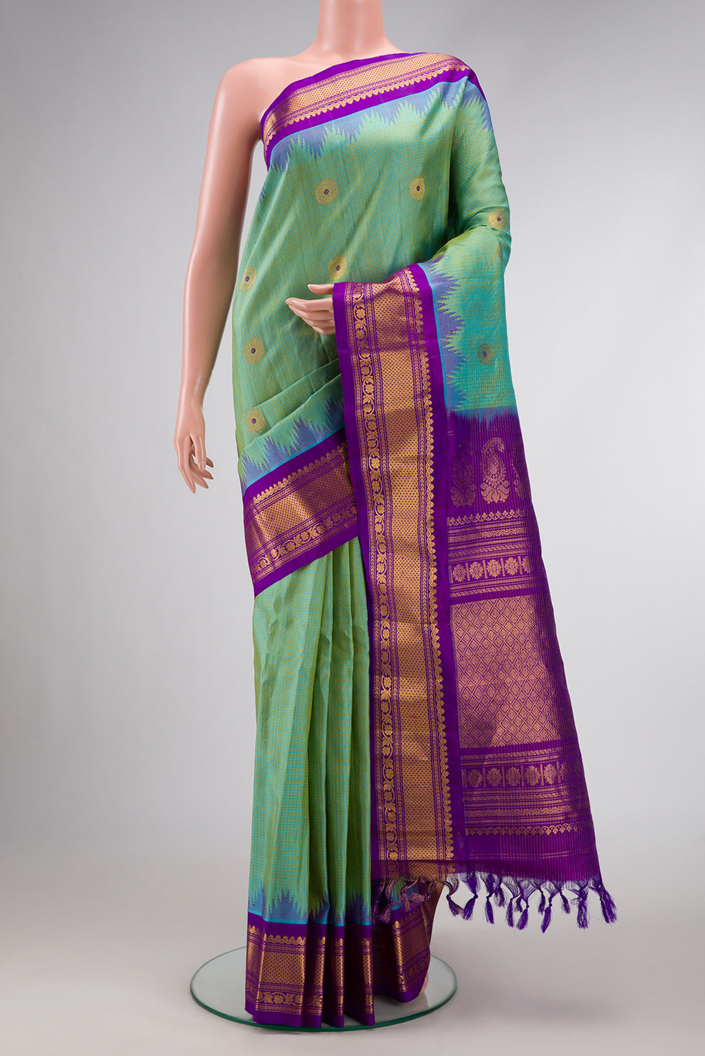 Light Green Dual Tone Gadwal Silk Saree with Zari And Thread Butta on the body and Zari Border.  displayed on a mannequin