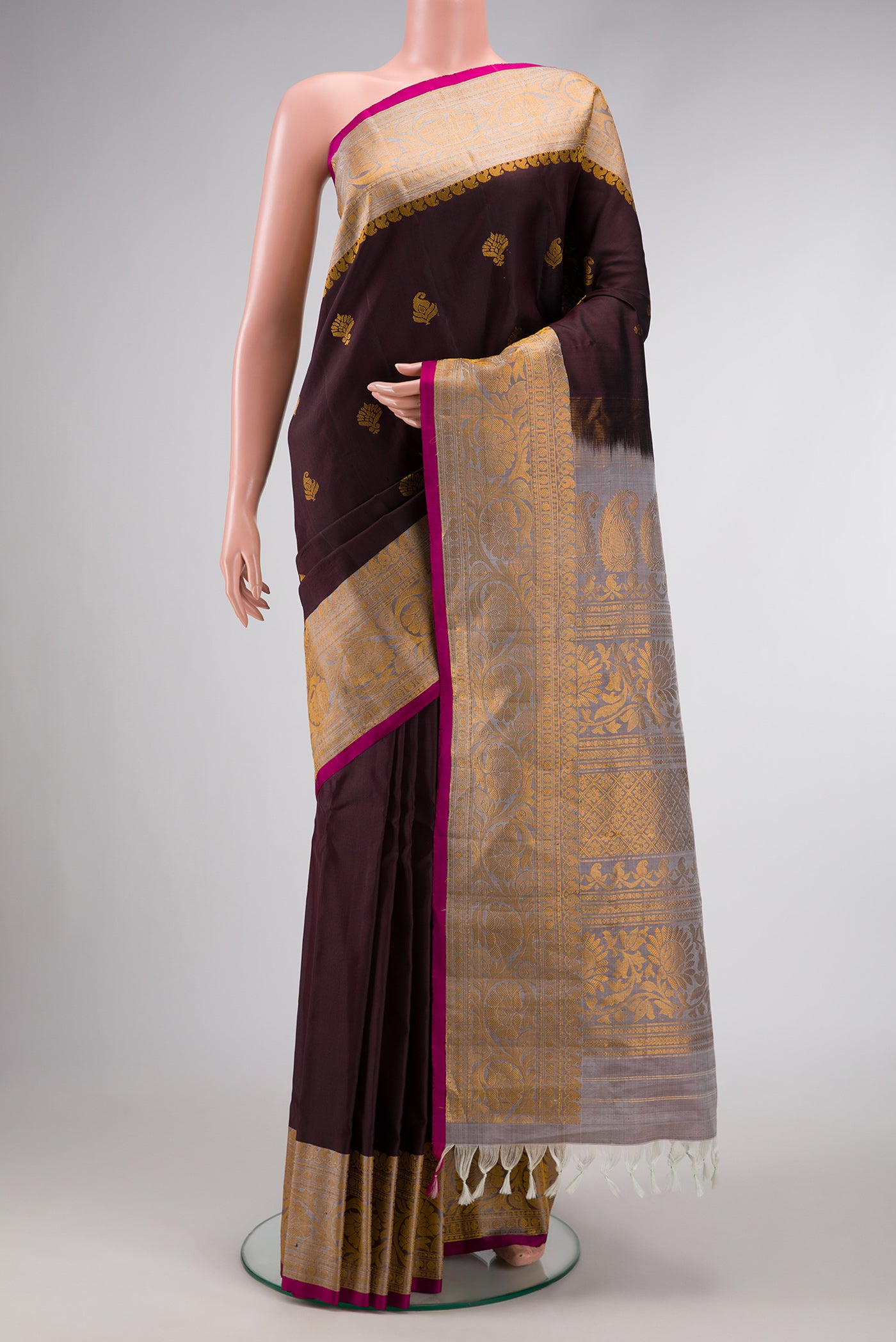Coffee Brown Dual Tone Gadwal Silk Saree with Zari Butta on the body and Zari Border.  displayed on a mannequin