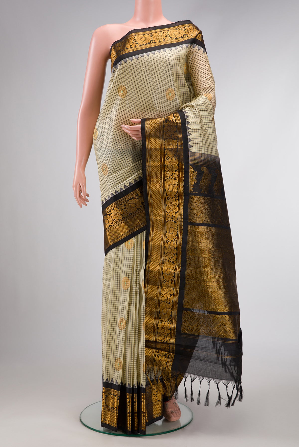 Sandal Dual Tone Gadwal Silk Saree with Checked design on the body and Zari Border.  displayed on a mannequin