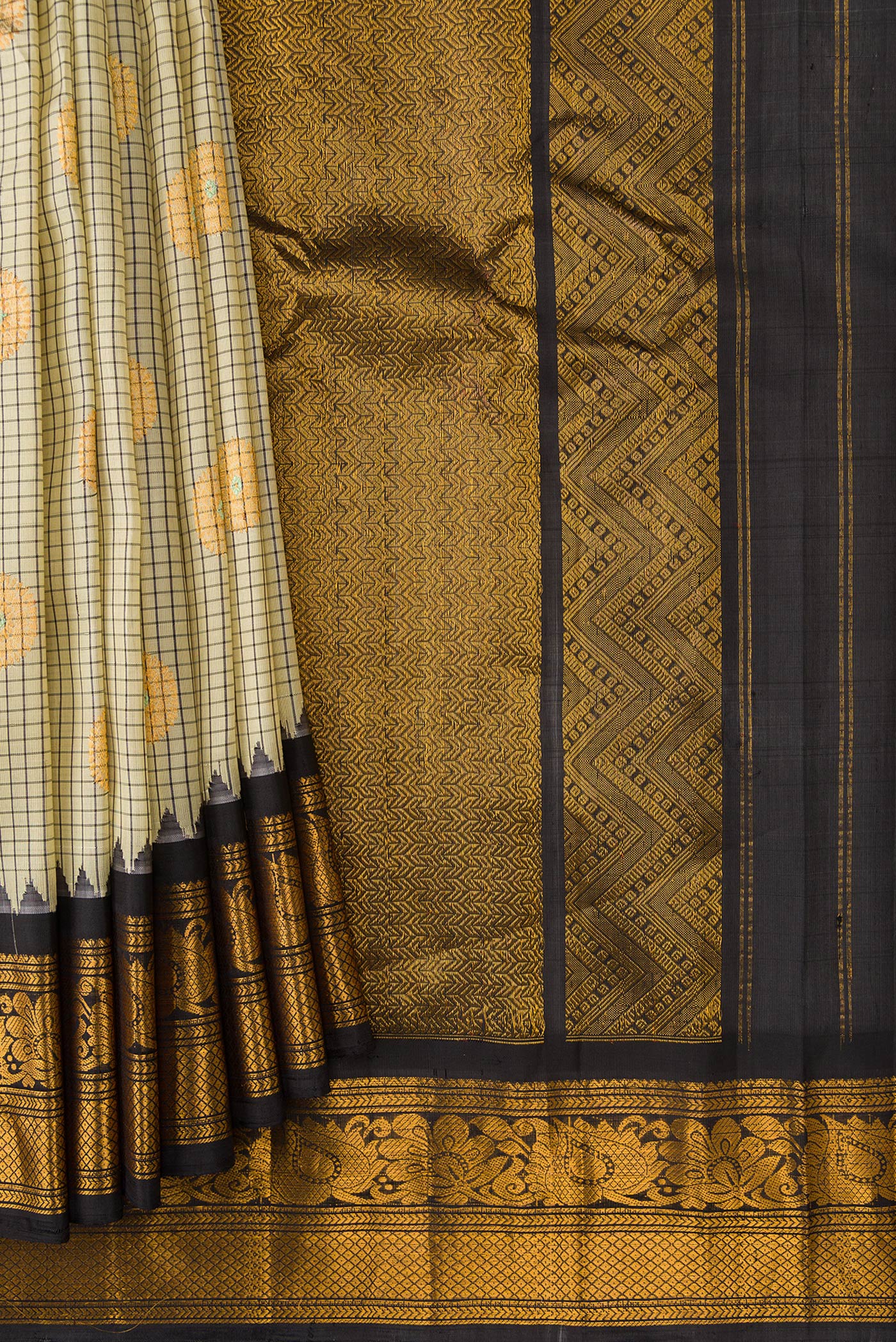 Pleats and pallu of Sandal Dual Tone Gadwal Silk Saree with Checked design on the body and Zari Border. 