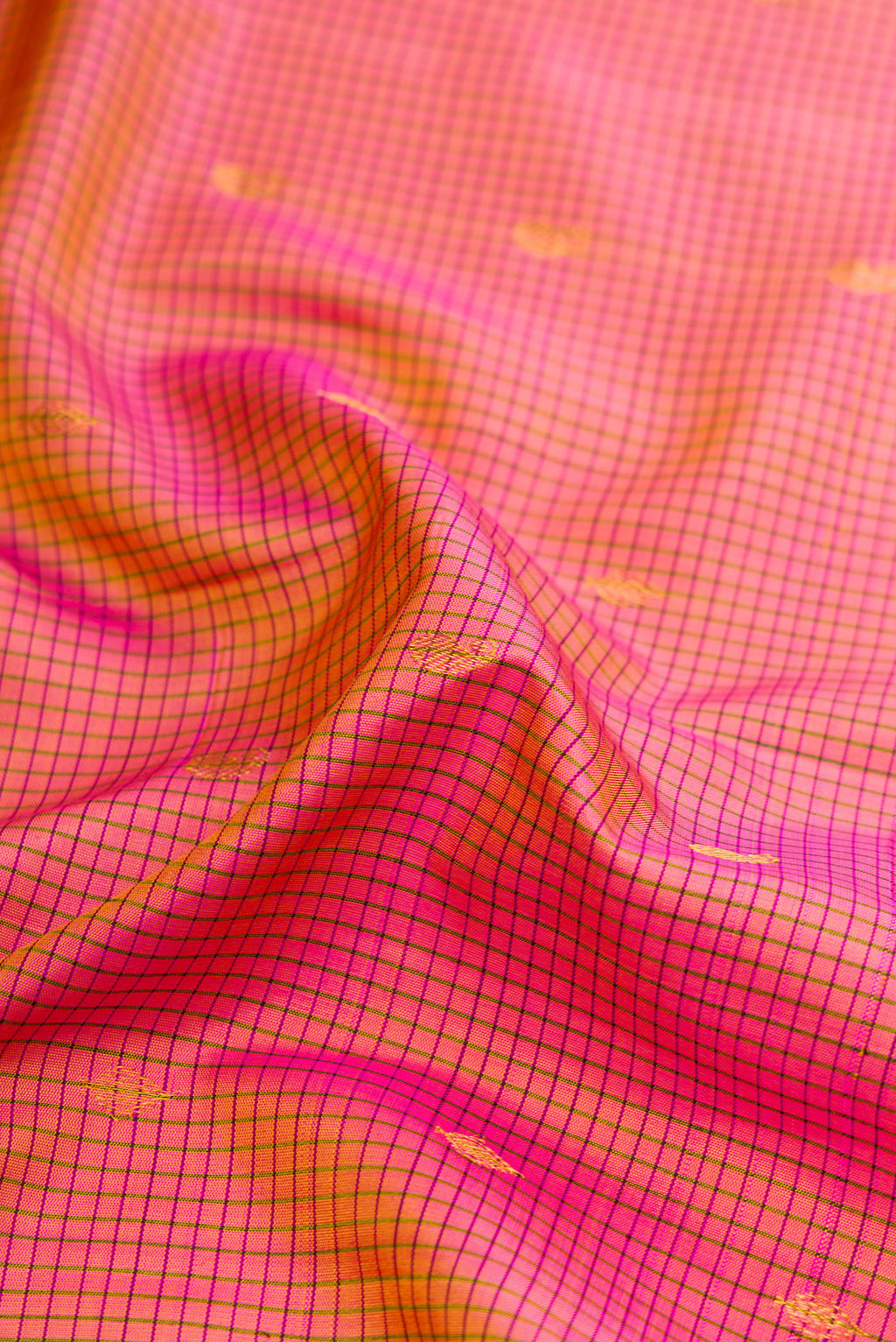 Close up of Pink Dual Tone Gadwal Silk Saree with Zari Butta on the body and Zari Border.  displaying folds