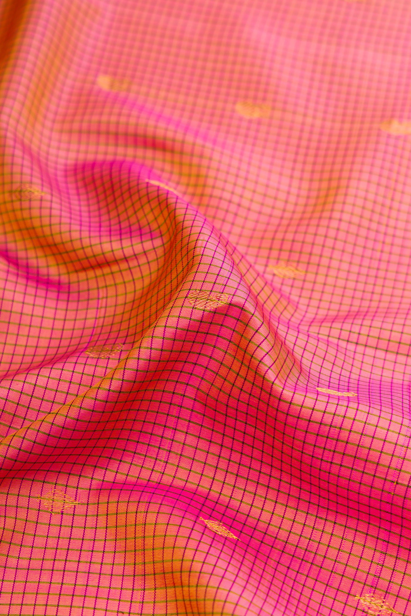 Close up of Pink Dual Tone Gadwal Silk Saree with Zari Butta on the body and Zari Border.  displaying folds