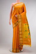 Mustard Dual Tone Gadwal Silk Saree with Zari Butta on the body and Paithani Border.  displayed on a mannequin