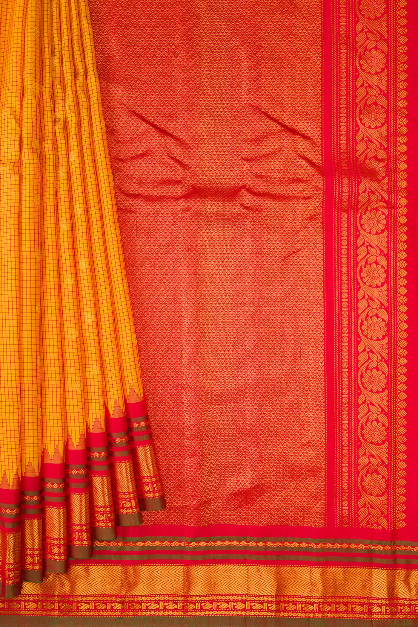 Pleats and pallu of Mustard Dual Tone Gadwal Silk Saree with Checked design on the body and Zari Border. 