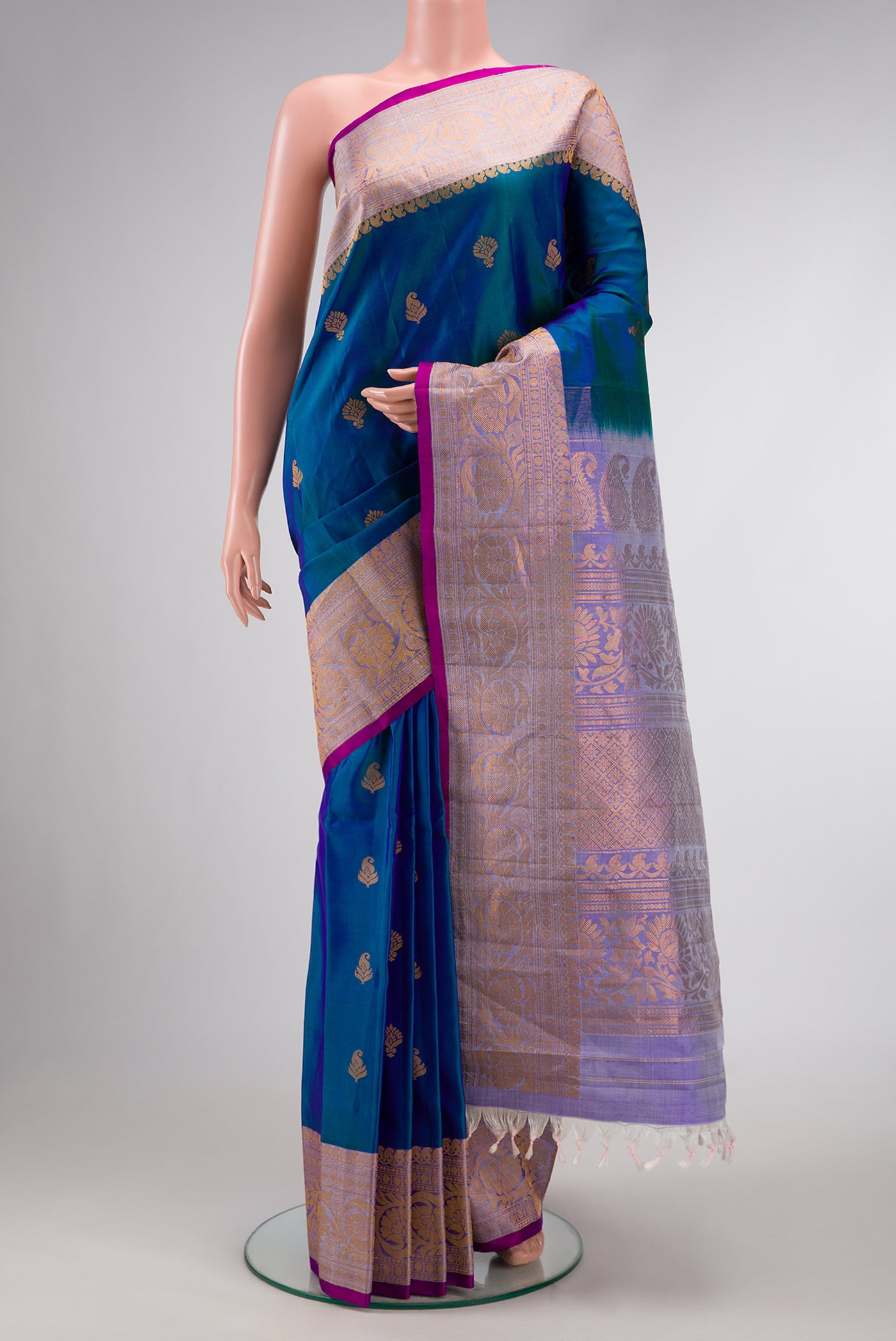 Peacock Blue Dual Tone Gadwal Silk Saree with Zari Butta on the body and Zari And Thread Border.  displayed on a mannequin