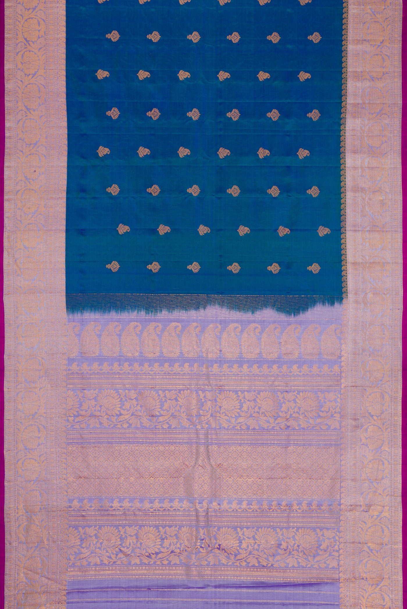 Flat view of Peacock Blue Dual Tone Gadwal Silk Saree with Zari Butta on the body and Zari And Thread Border. 