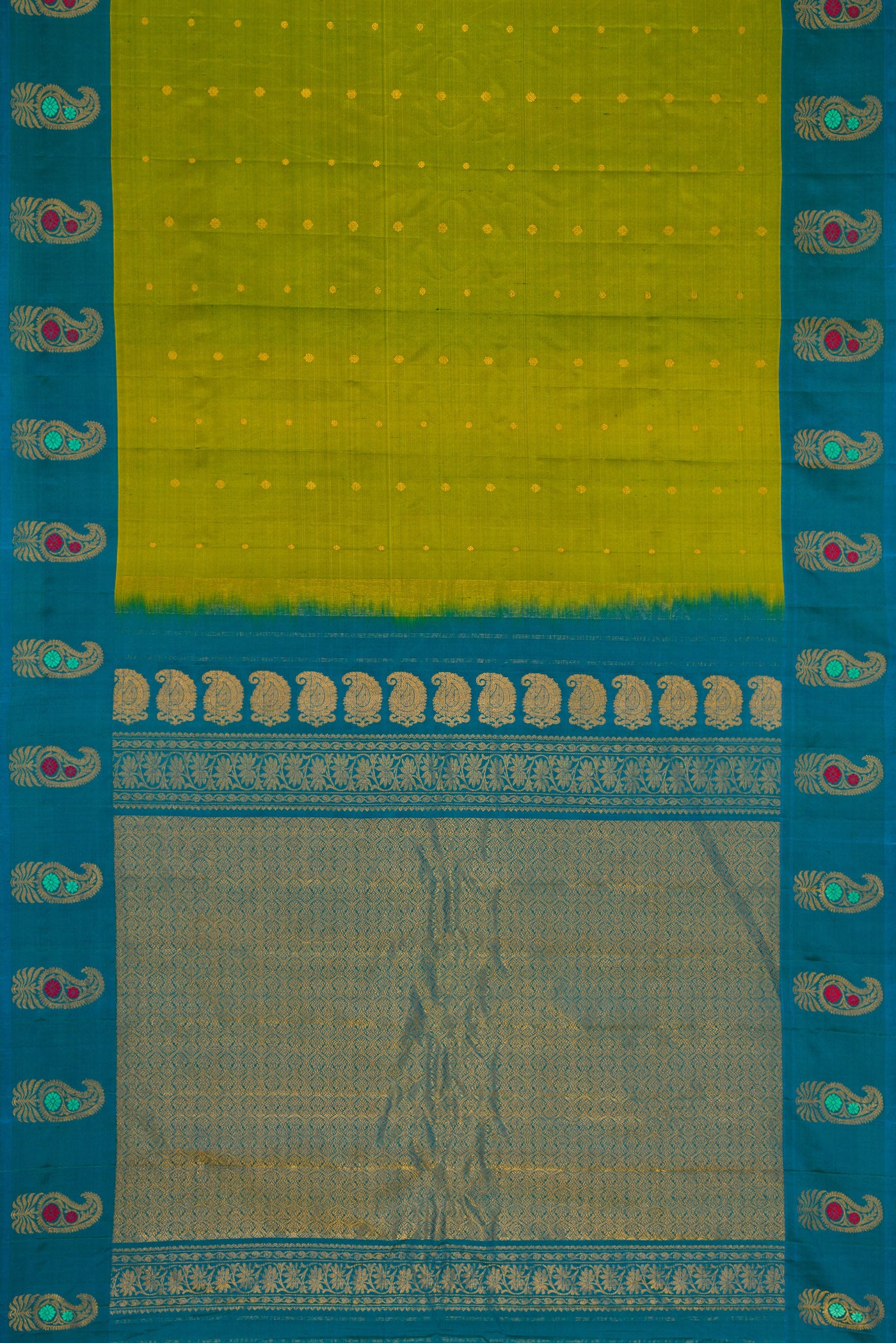 Flat view of Green Dual Tone Gadwal Silk Saree with Zari Butta on the body and Fancy Border. 