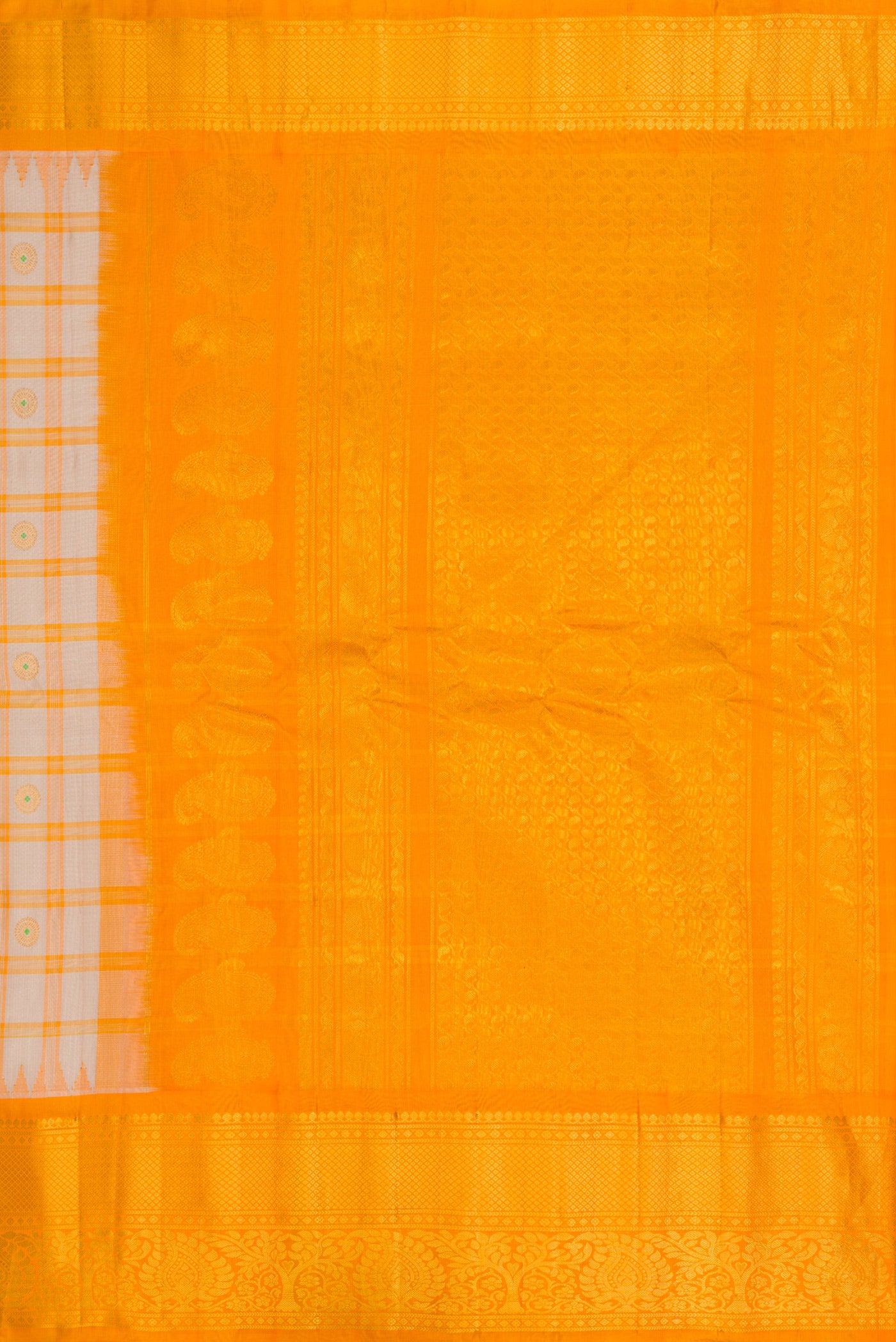 Close up image of the pallu of Grey Dual Tone Gadwal Silk Saree with Checked design on the body and Zari Border. 