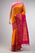 Mustard Dual Tone Gadwal Silk Saree with Zari Butta on the body and Zari Border.  displayed on a mannequin