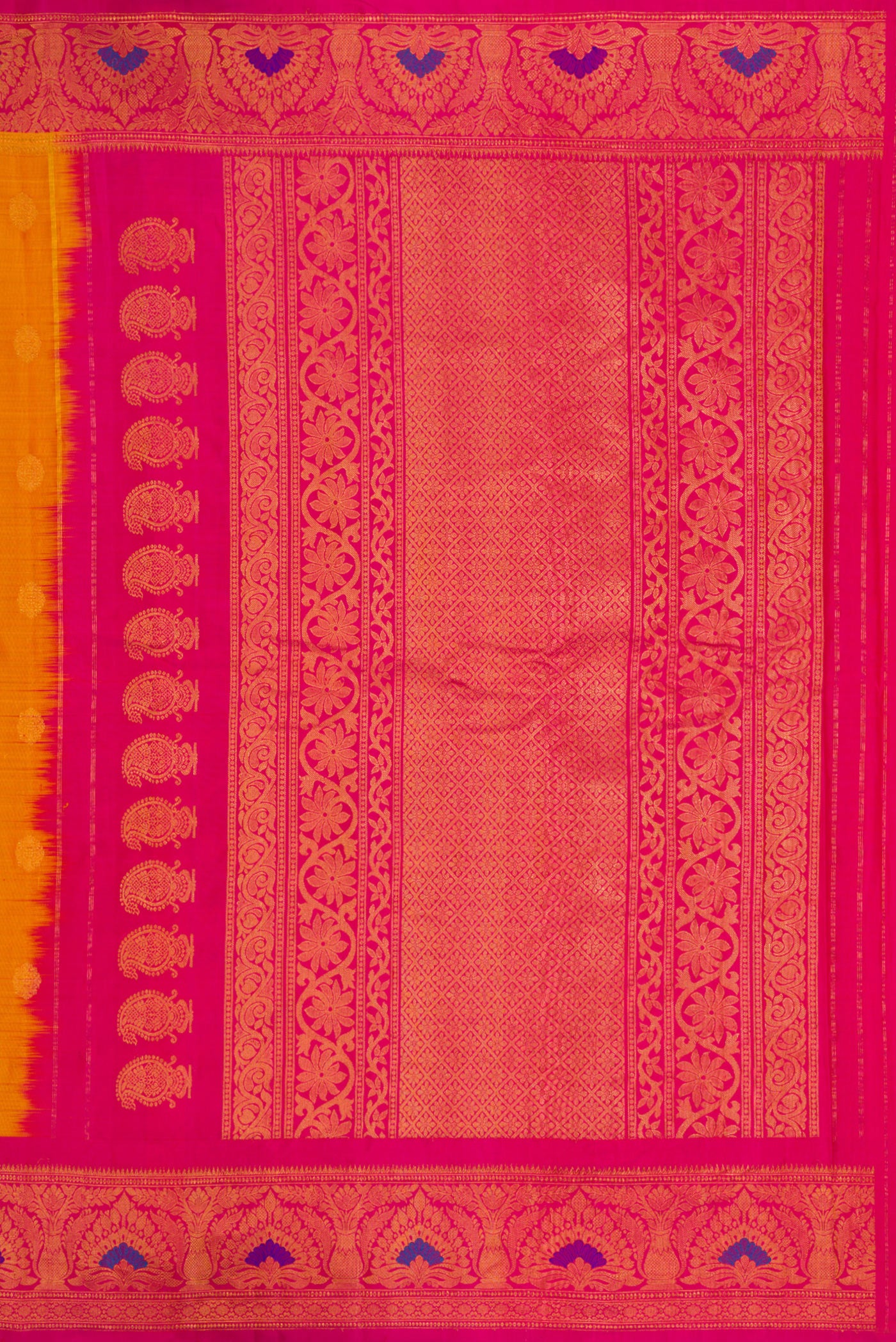 Close up image of the pallu of Mustard Dual Tone Gadwal Silk Saree with Zari Butta on the body and Zari Border. 