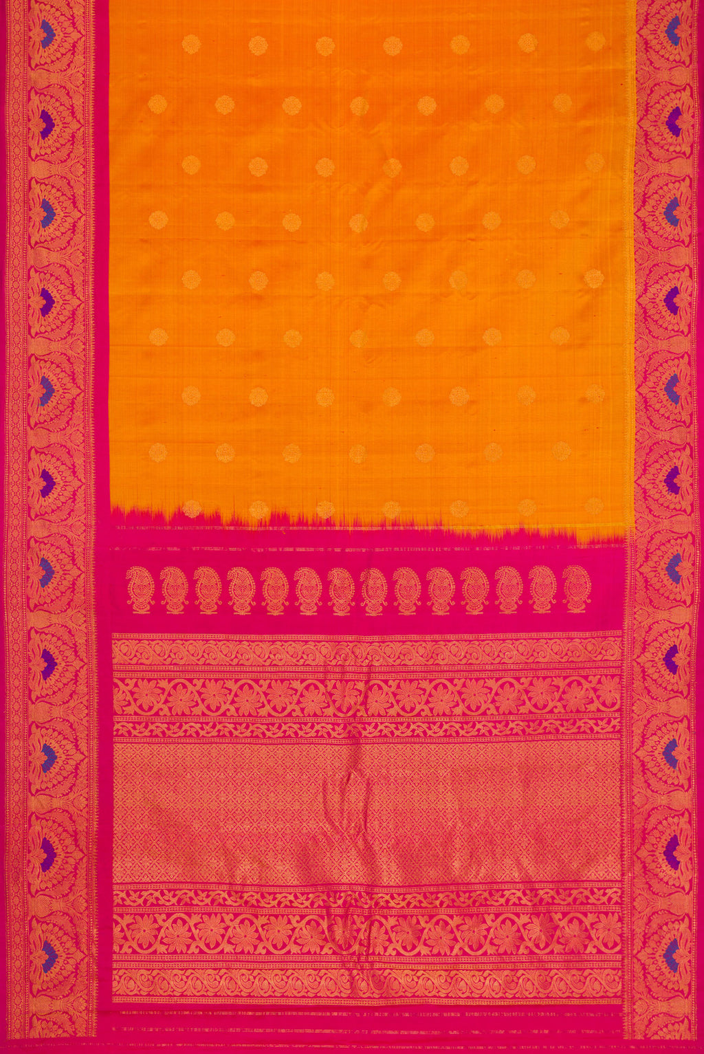 Flat view of Mustard Dual Tone Gadwal Silk Saree with Zari Butta on the body and Zari Border. 