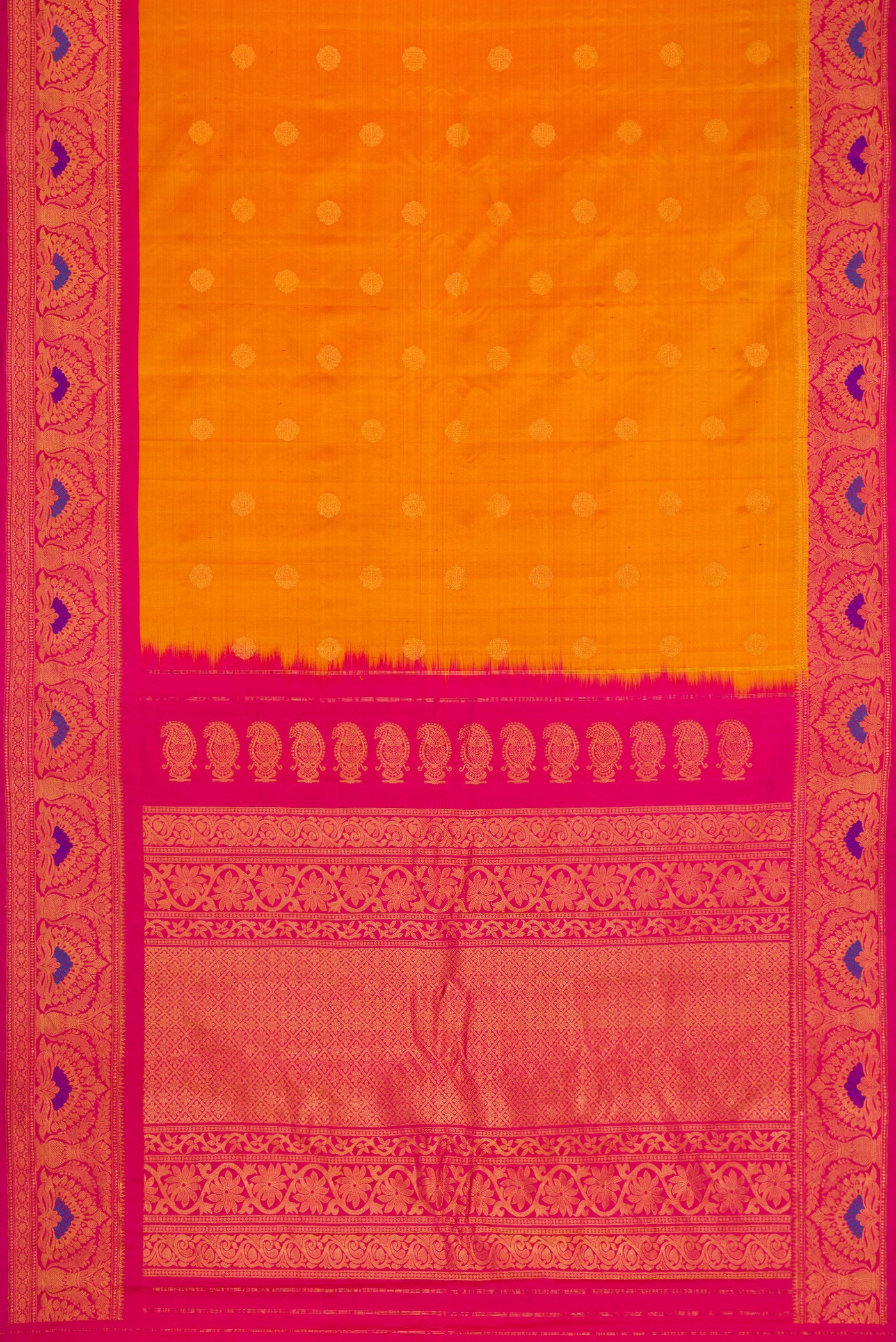 Flat view of Mustard Dual Tone Gadwal Silk Saree with Zari Butta on the body and Zari Border. 