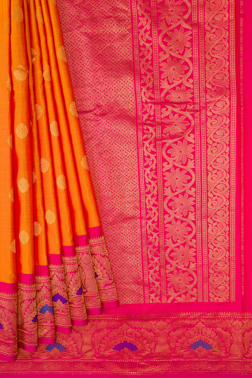 Pleats and pallu of Mustard Dual Tone Gadwal Silk Saree with Zari Butta on the body and Zari Border. 