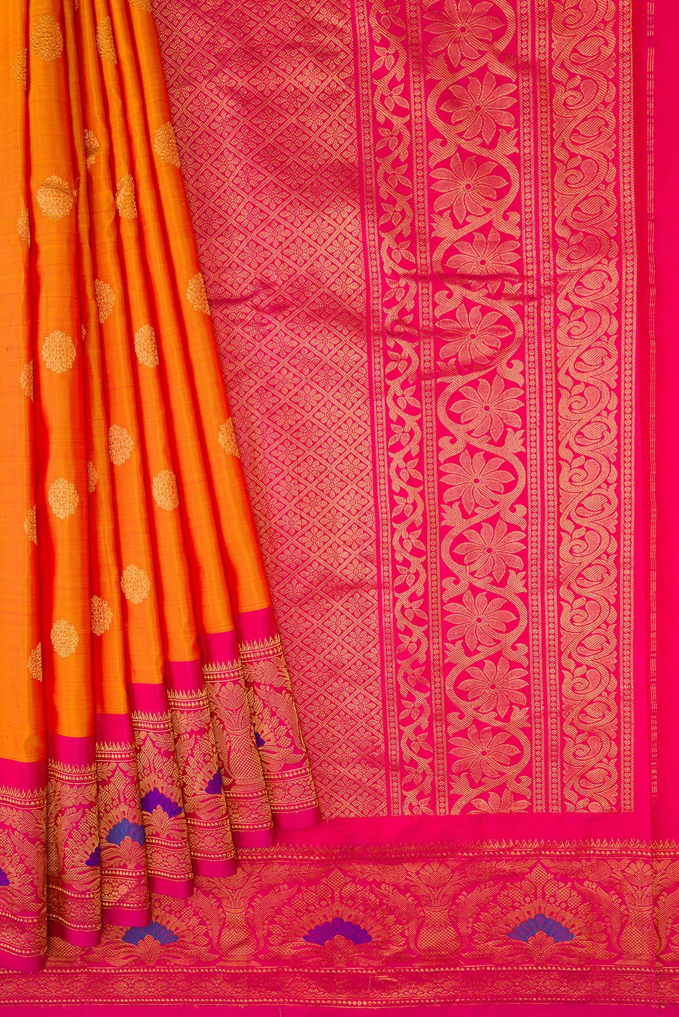 Pleats and pallu of Mustard Dual Tone Gadwal Silk Saree with Zari Butta on the body and Zari Border. 