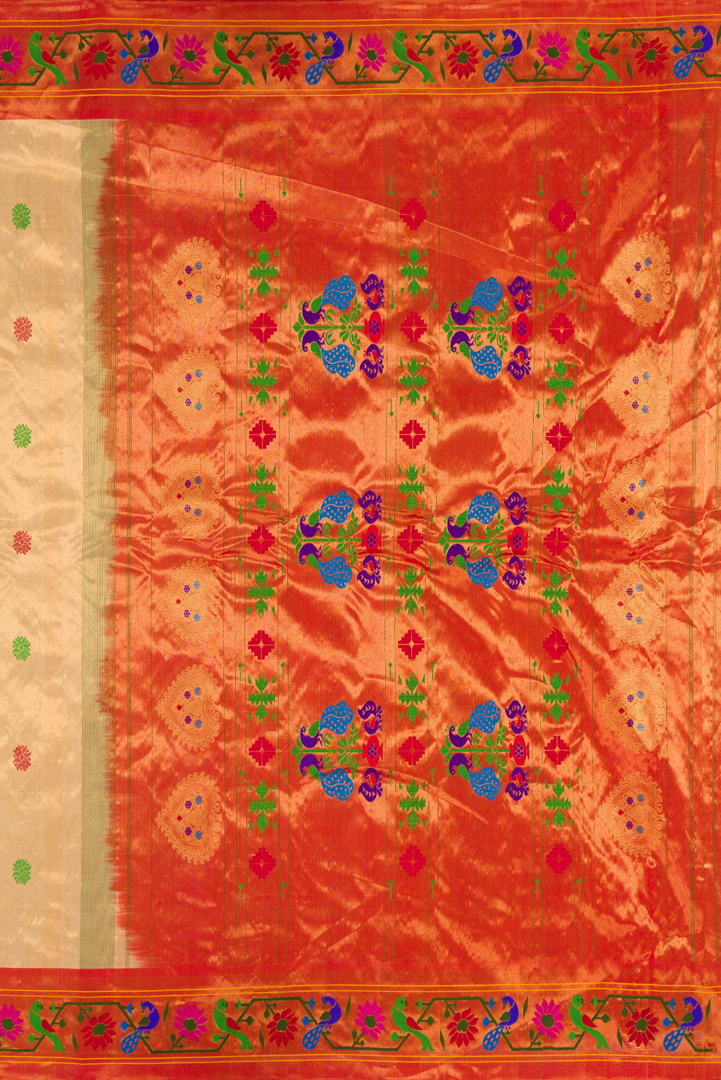 Close up image of the pallu of Gold Dual Tone Gadwal Silk Saree with Zari And Thread Butta on the body and Zari And Thread Border. 