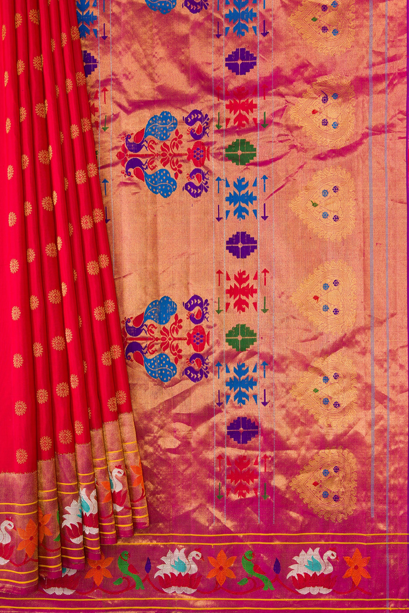 Pleats and pallu of Red Dual Tone Gadwal Silk Saree with Zari Butta on the body and Zari And Thread Border. 