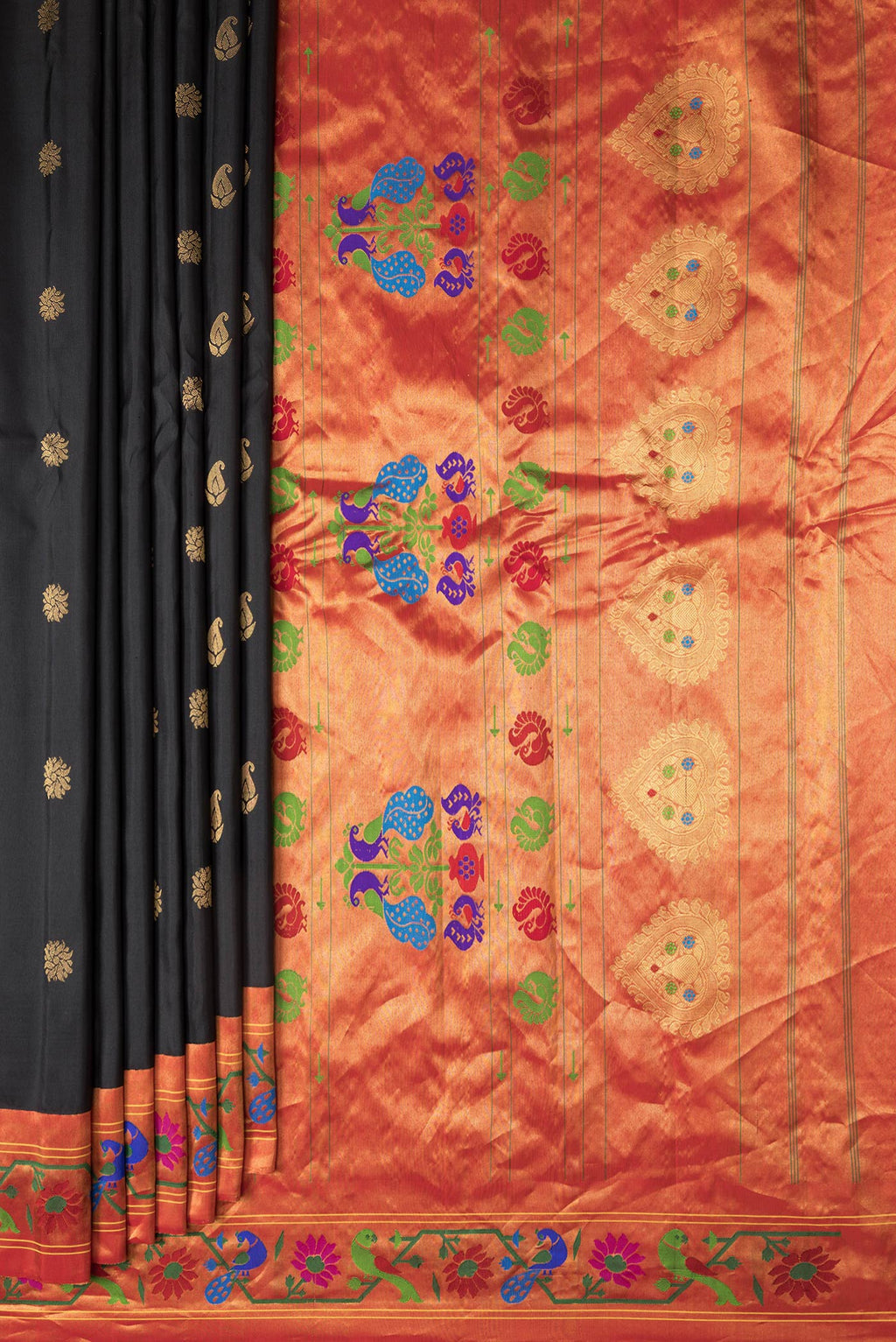 Pleats and pallu of Black Dual Tone Gadwal Silk Saree with Zari Butta on the body and Zari Border. 