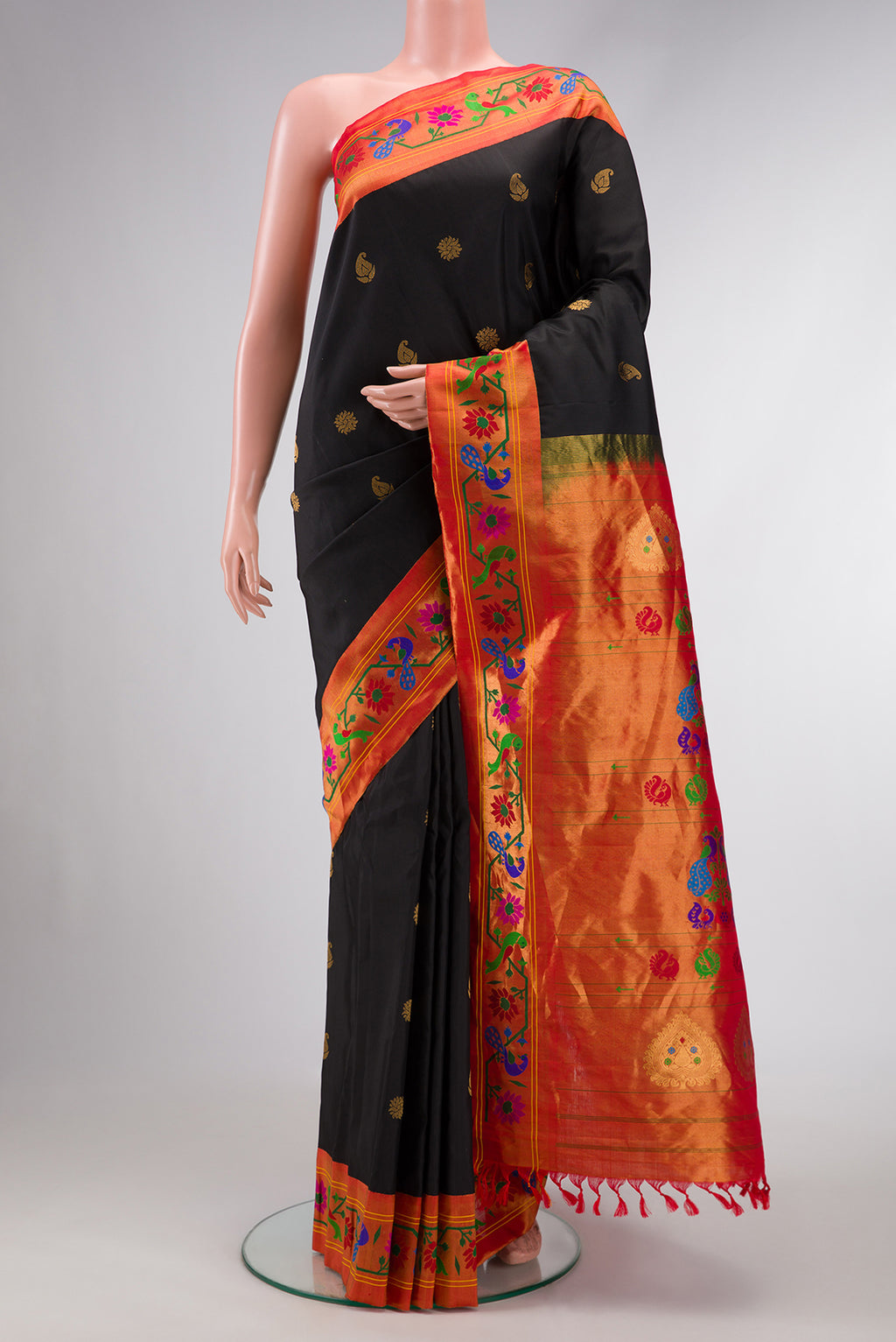 Black Dual Tone Gadwal Silk Saree with Zari Butta on the body and Paithani Border.  displayed on a mannequin