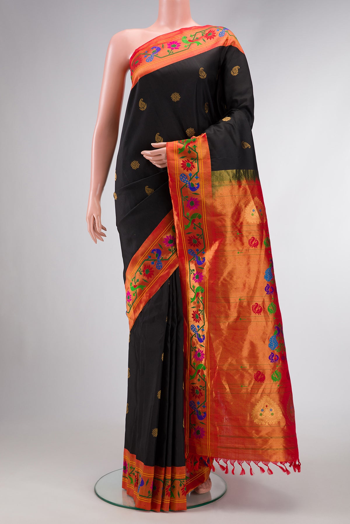 Black Dual Tone Gadwal Silk Saree with Zari Butta on the body and Paithani Border.  displayed on a mannequin