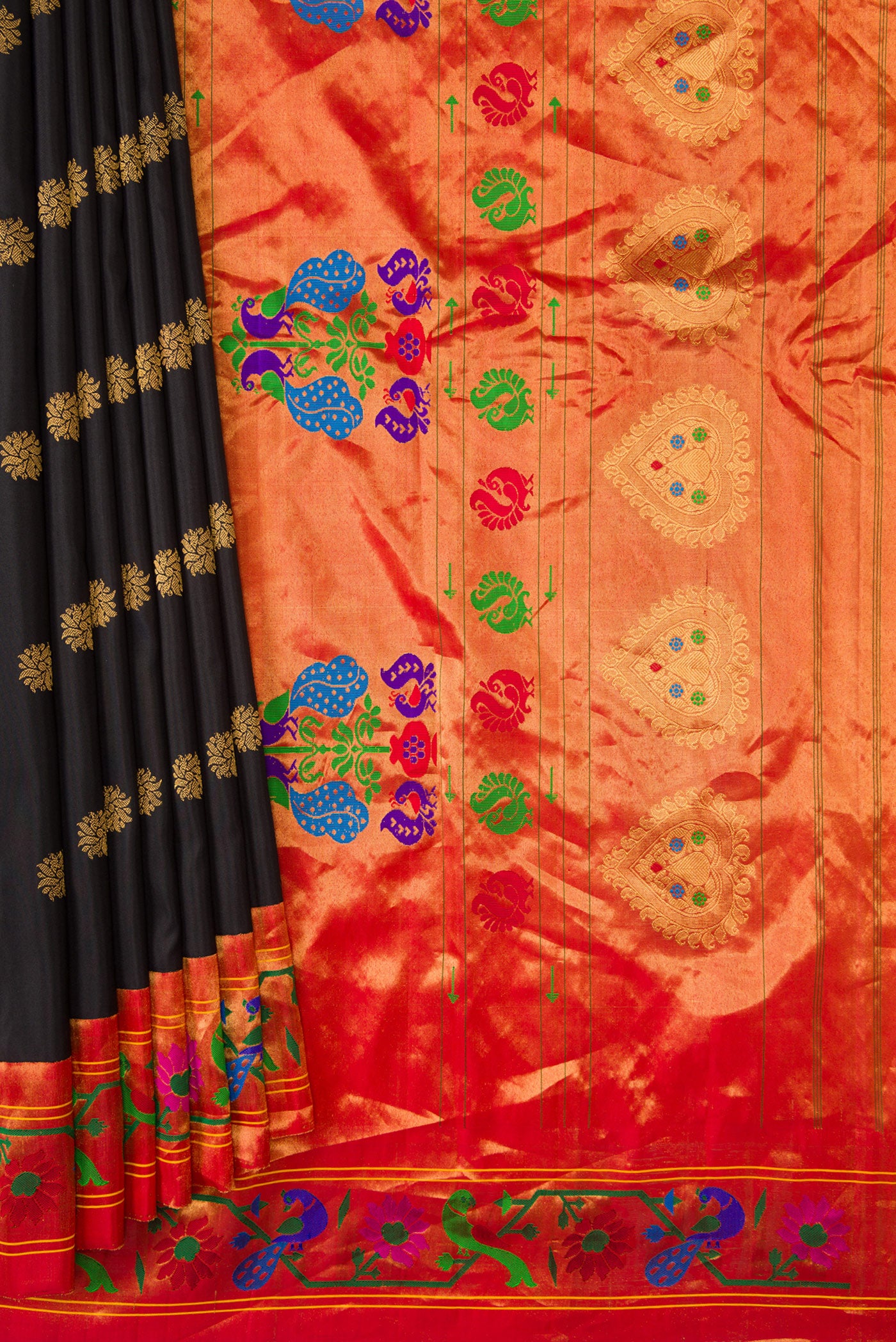Pleats and pallu of Black Dual Tone Gadwal Silk Saree with Zari Butta on the body and Paithani Border. 