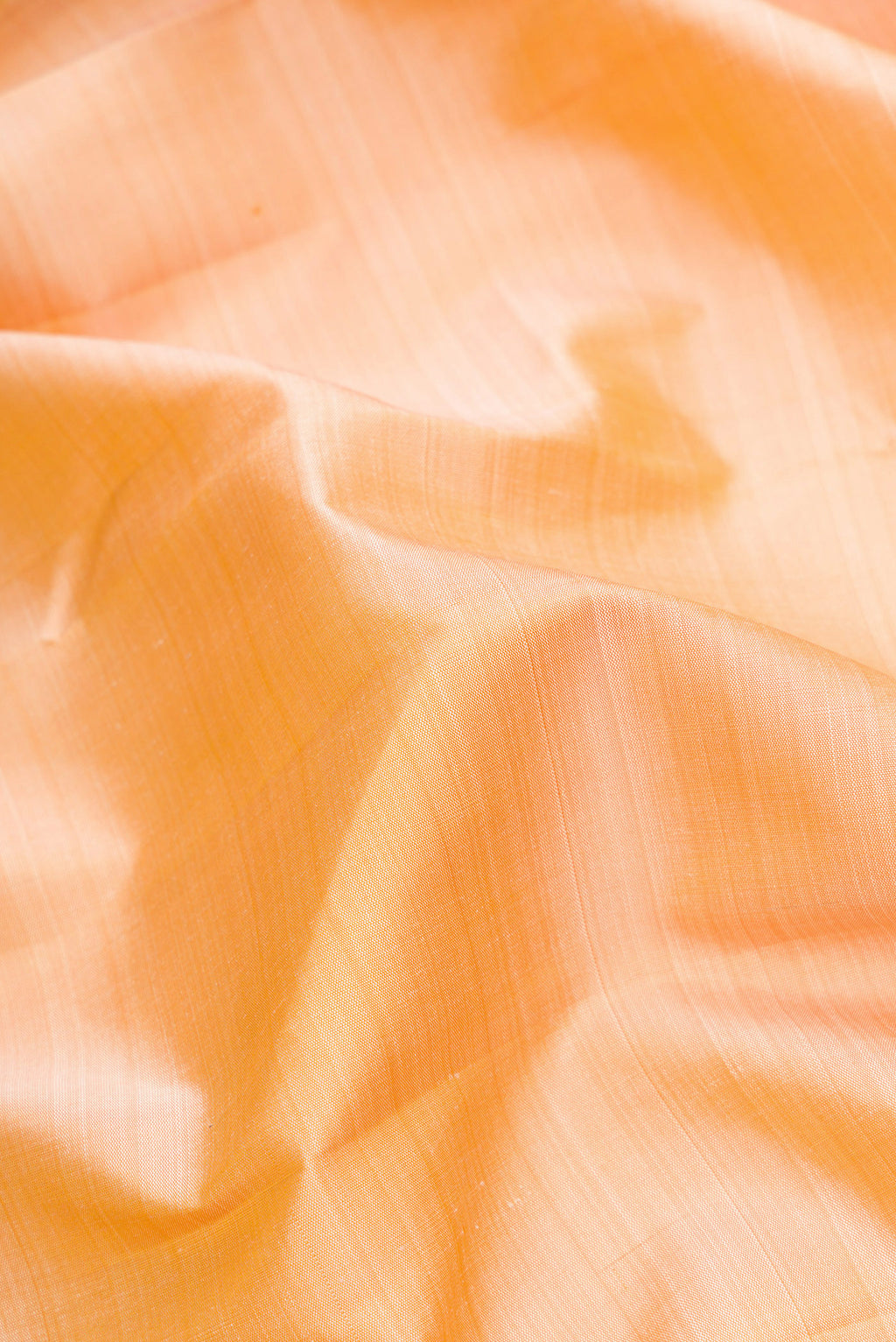 Close up of Sandal Dual Tone Kanjivaram Silk Saree with Plain Body and Temple Border.  displaying folds