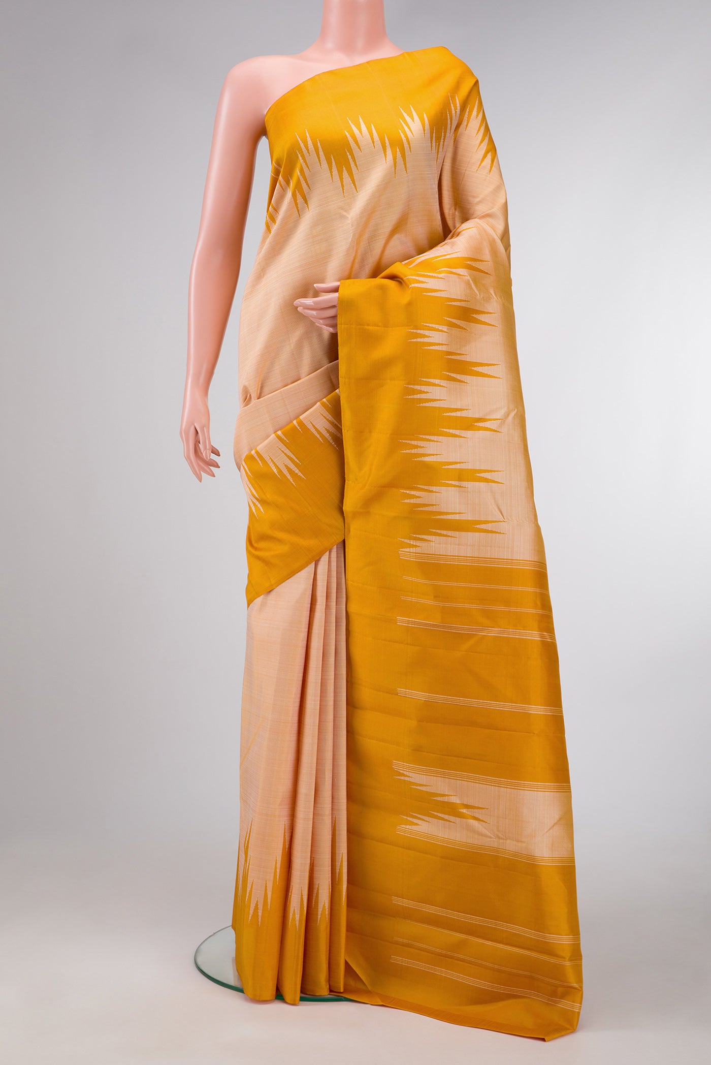 Sandal Dual Tone Kanjivaram Silk Saree with Plain Body and Temple Border.  displayed on a mannequin