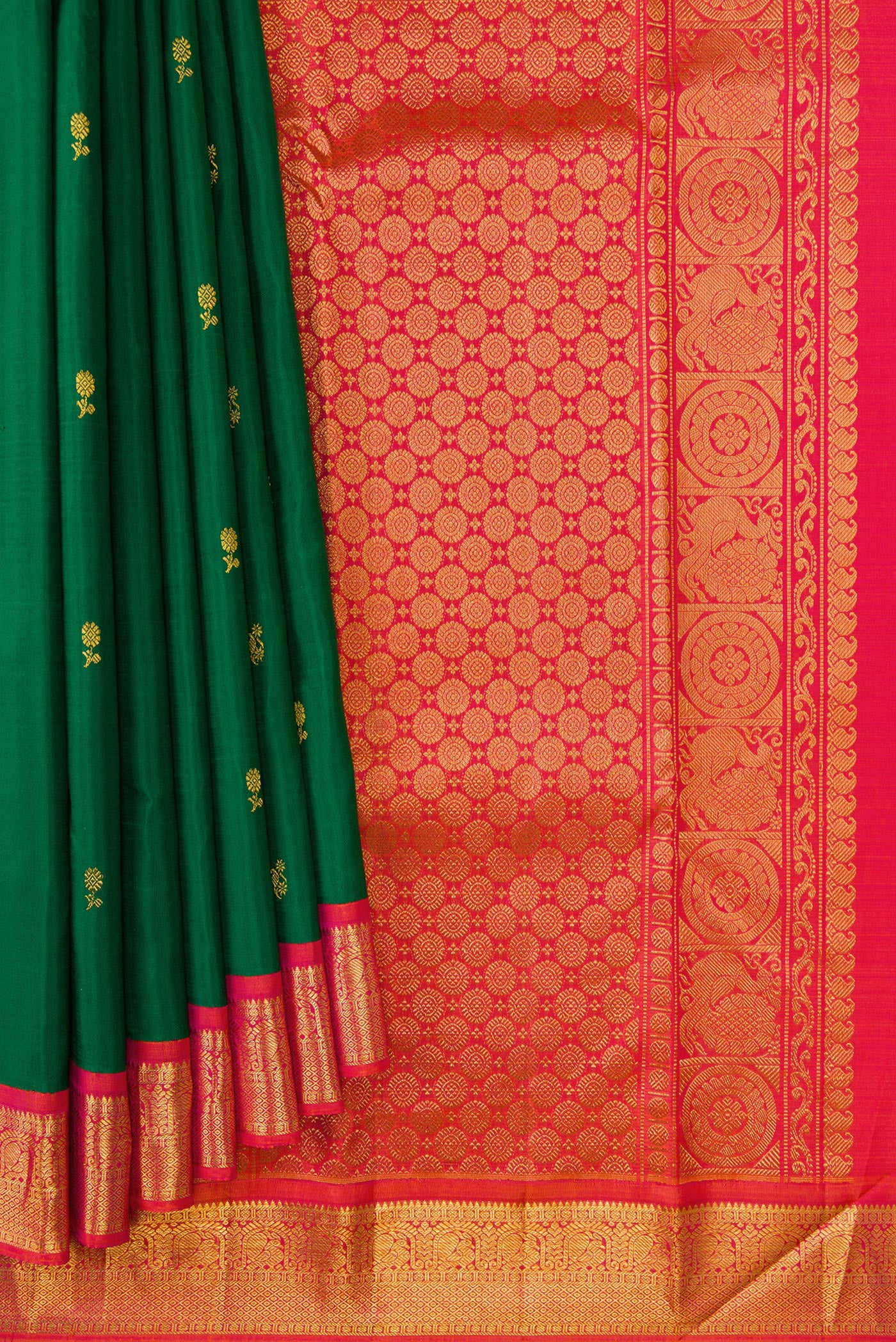 Pleats and pallu of Green Dual Tone Kanjivaram Silk Saree with Zari Butta on the body and Zari Border. 