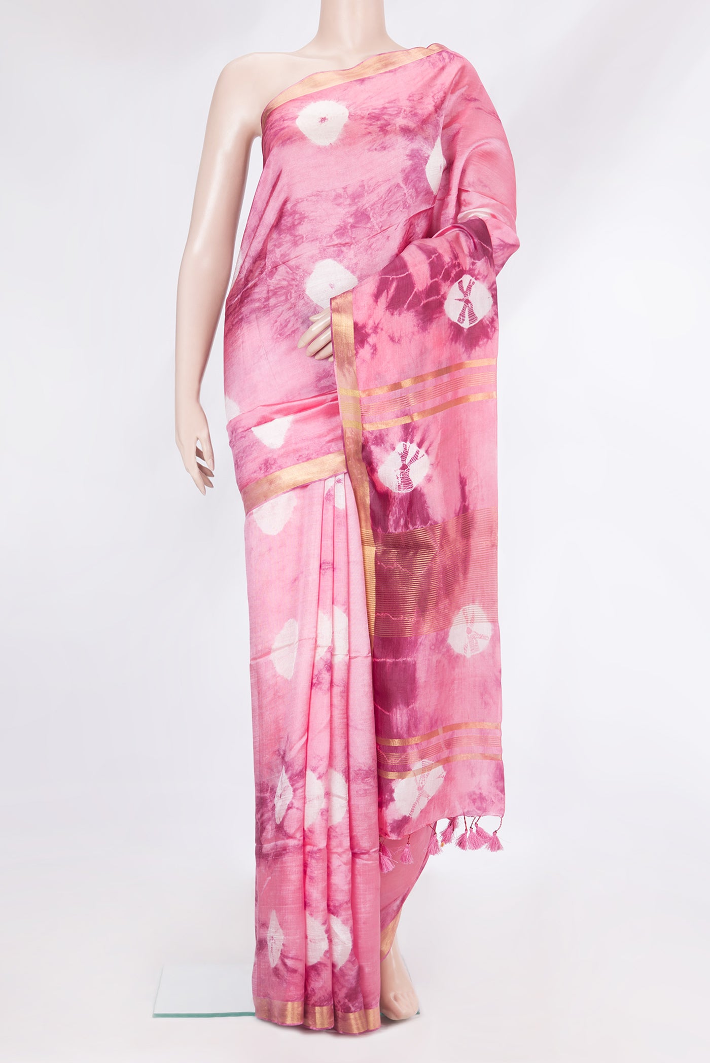 Rose pink Dual Tone Blended Tussar Silk Saree with Printed design on the body and Zari Border.  displayed on a mannequin
