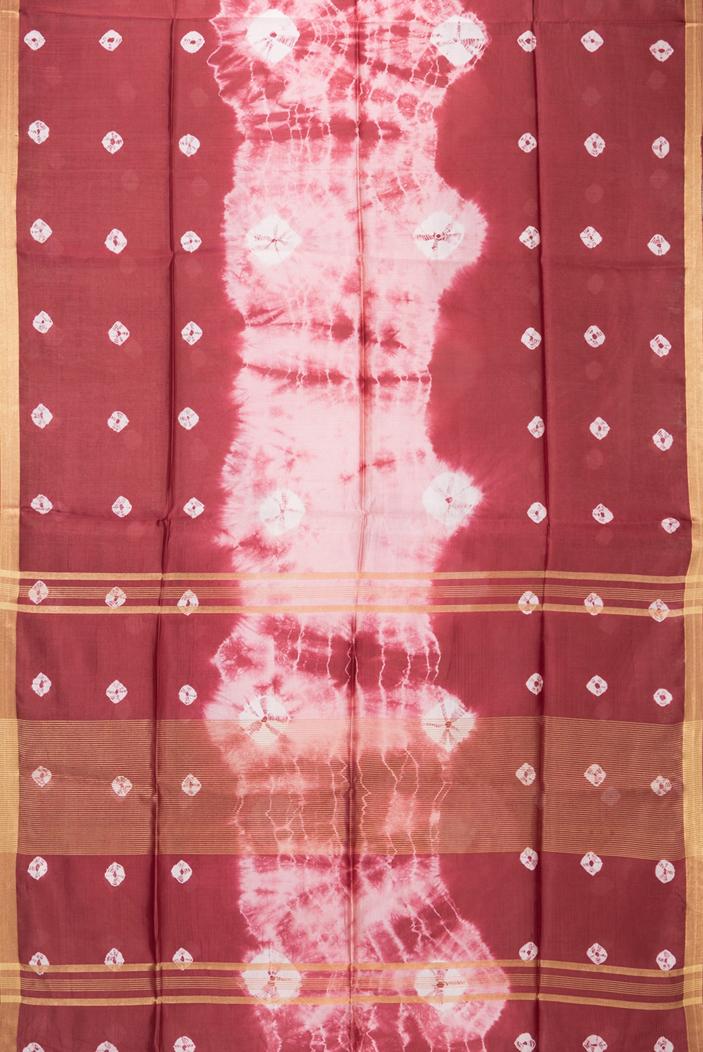Flat view of Maroon Dual Tone Blended Tussar Silk Saree with Bandhani Print on the body and Zari Border. 
