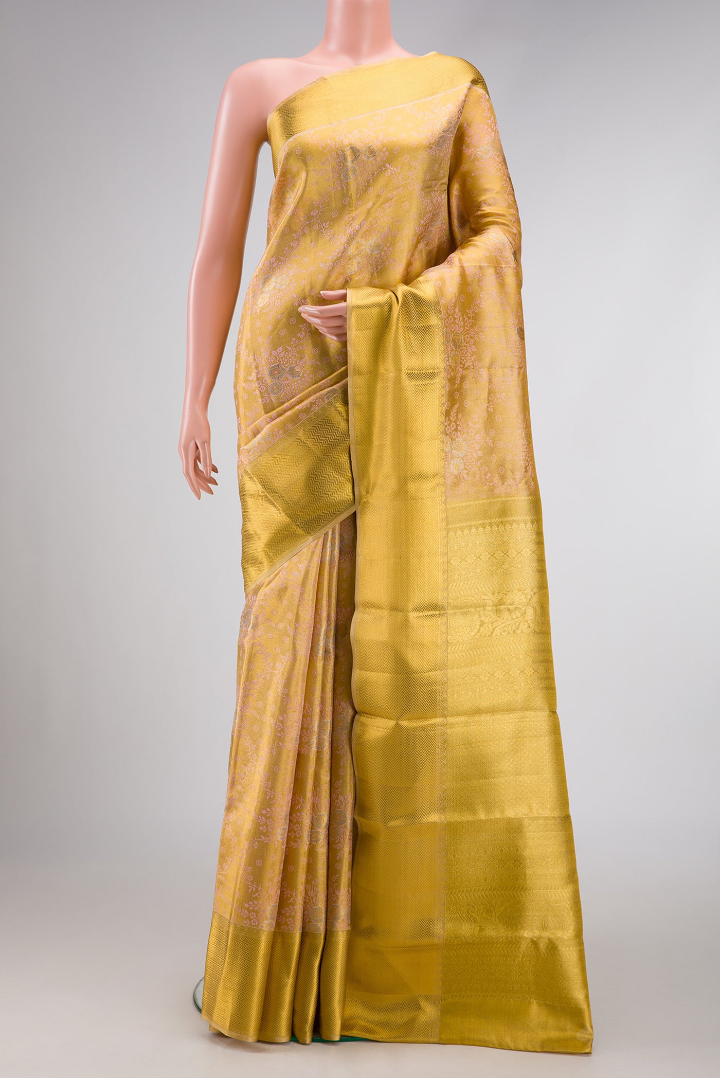 Pink Dual Tone Kanjivaram Tissue Silk Saree with Zari Brocade on the body and Zari Border.  displayed on a mannequin