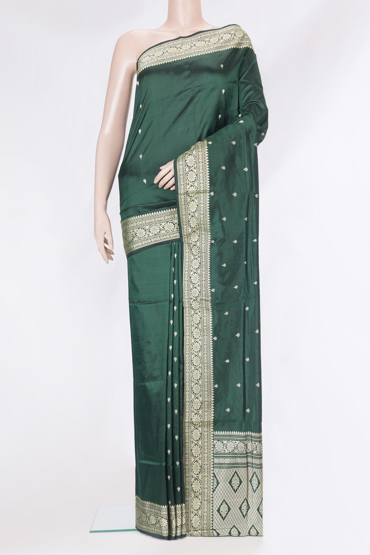 Bottle Green Banarasi Silk Saree with Thread Butta on the body and Thread Border.  displayed on a mannequin