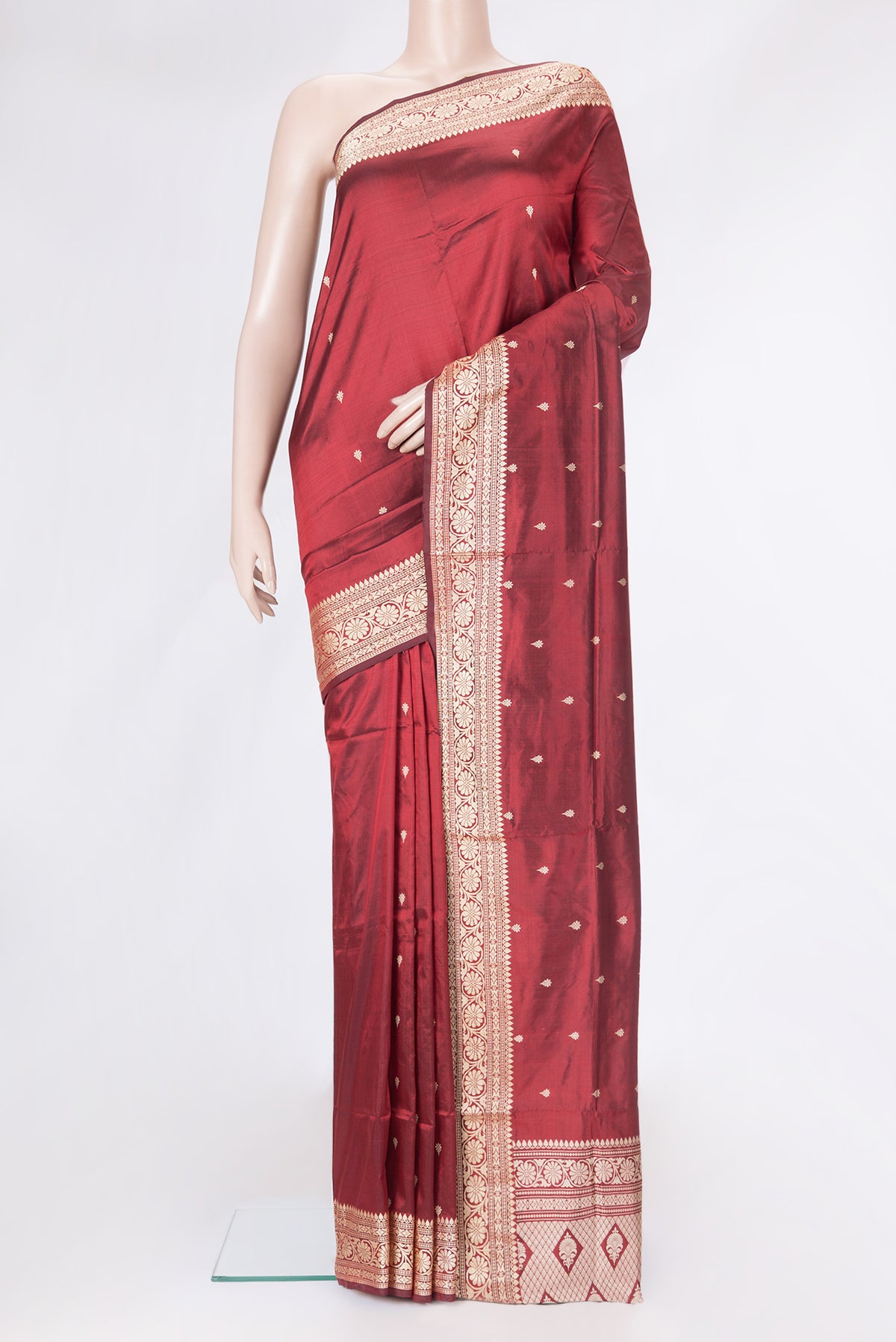 Maroon Dual Tone Banarasi Silk Saree with Thread Butta on the body and Thread Border.  displayed on a mannequin