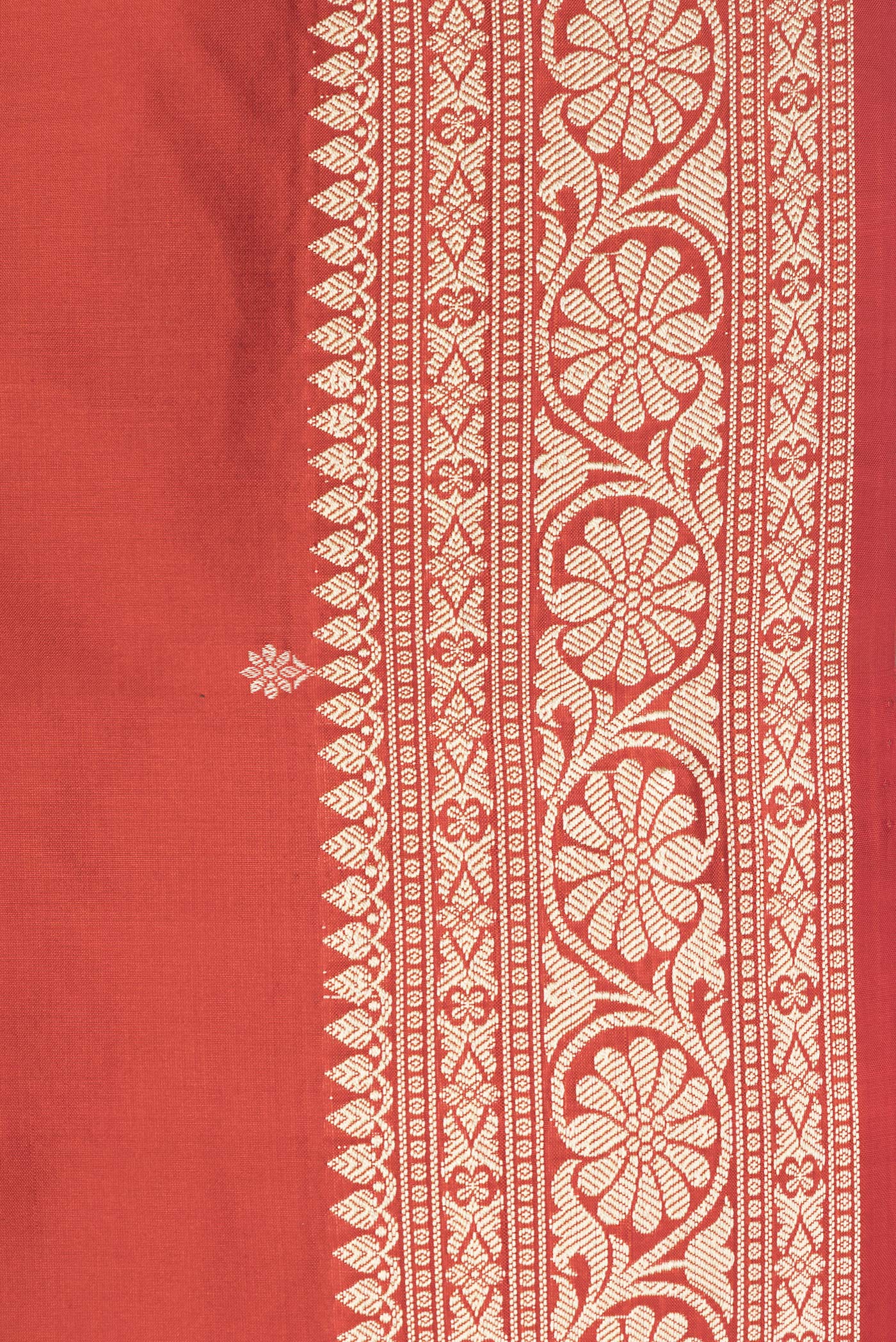Border image of Brick Orange Dual Tone Banarasi Silk Saree with Thread Butta on the body and Thread Border. 
