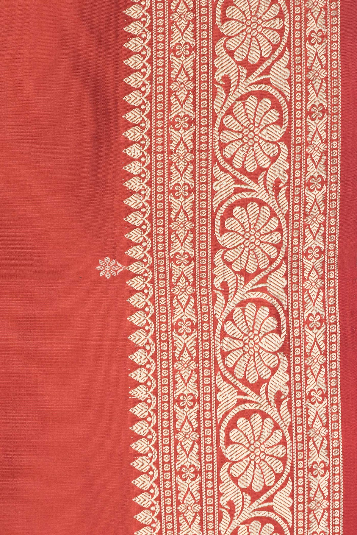Border image of Brick Orange Dual Tone Banarasi Silk Saree with Thread Butta on the body and Thread Border. 