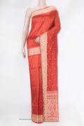 Brick Orange Dual Tone Banarasi Silk Saree with Thread Butta on the body and Thread Border.  displayed on a mannequin