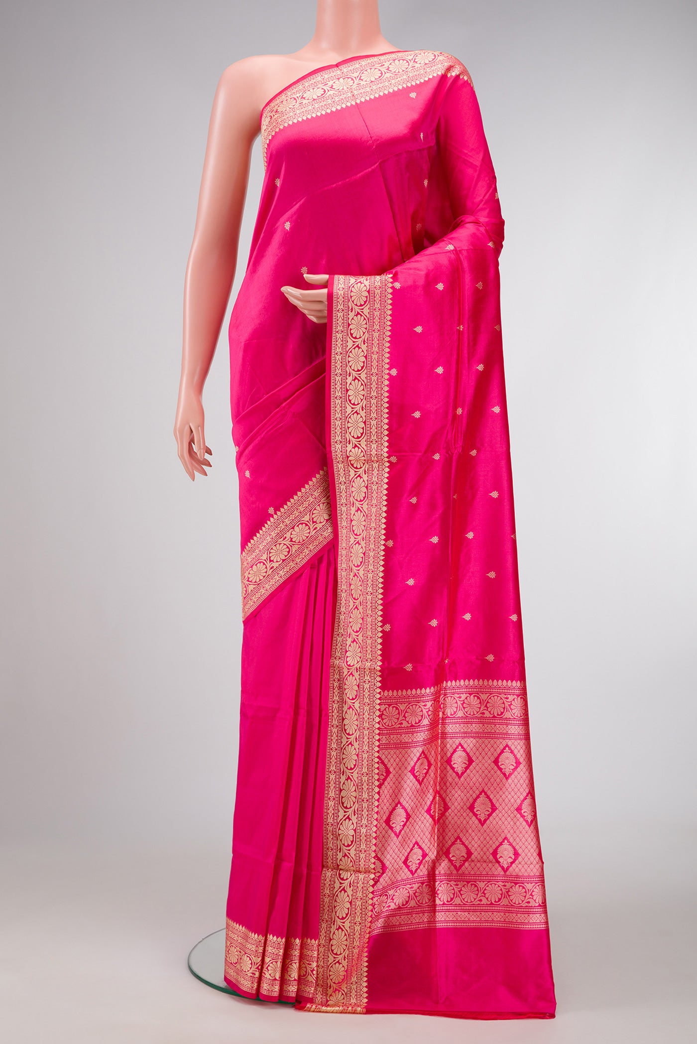 Pink Dual Tone Banarasi Silk Saree with Thread Butta on the body and Thread Border.  displayed on a mannequin