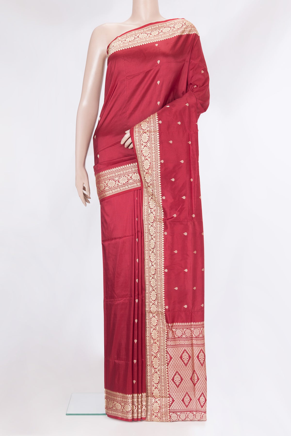 Maroon Banarasi Silk Saree with Thread Butta on the body and Thread Border.  displayed on a mannequin