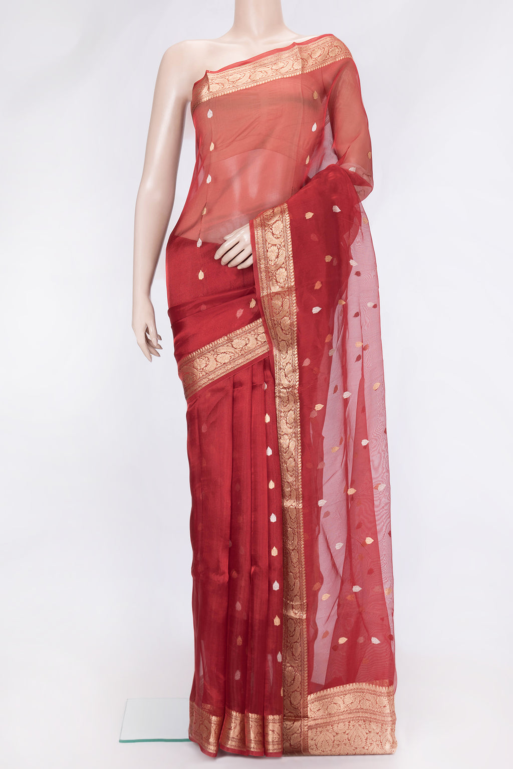 Red Dual Tone Organza Silk Saree with Zari Butta on the body and Zari Border.  displayed on a mannequin