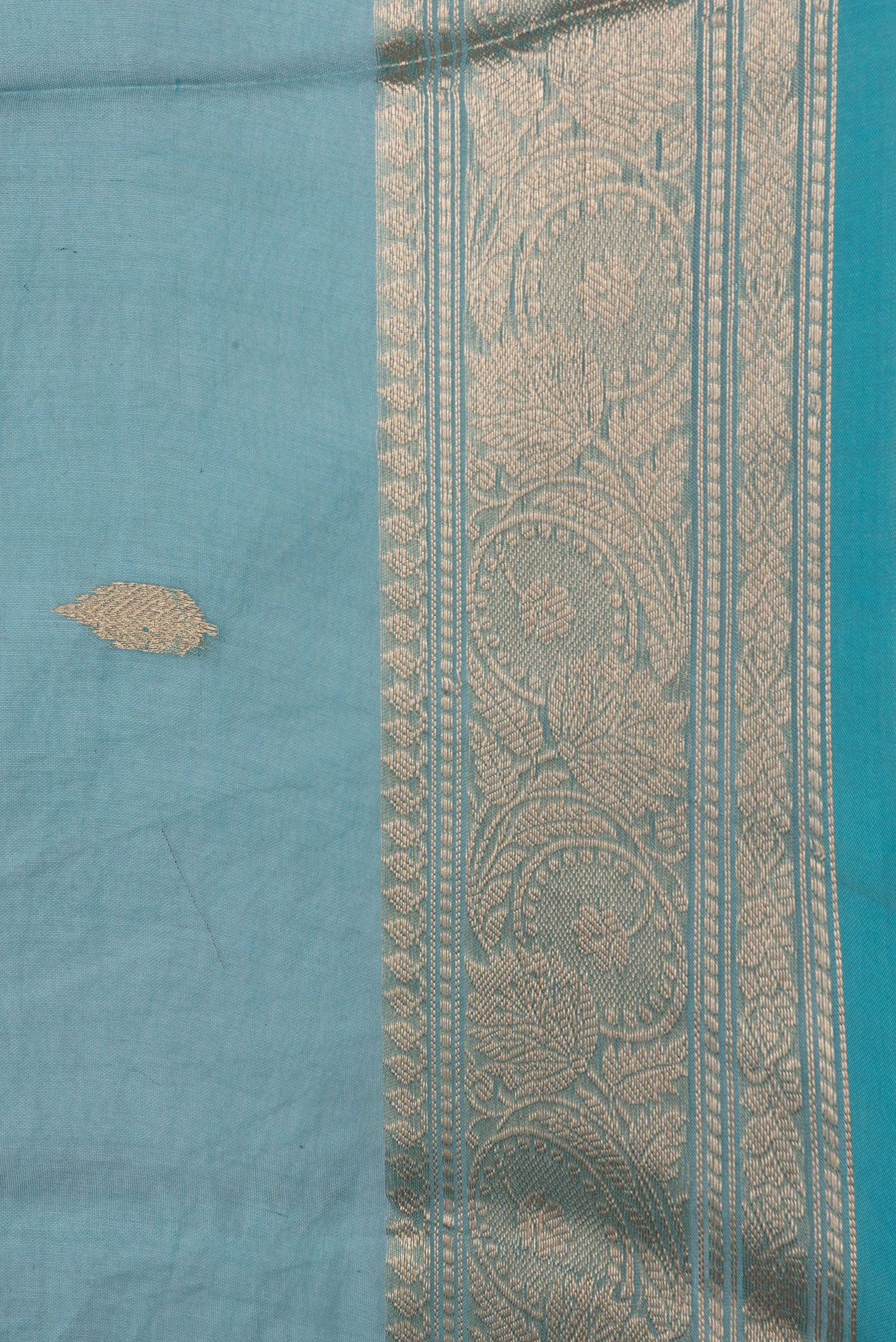 Border image of Sky Blue Dual Tone Organza Silk Saree with Zari Butta on the body and Zari Border. 