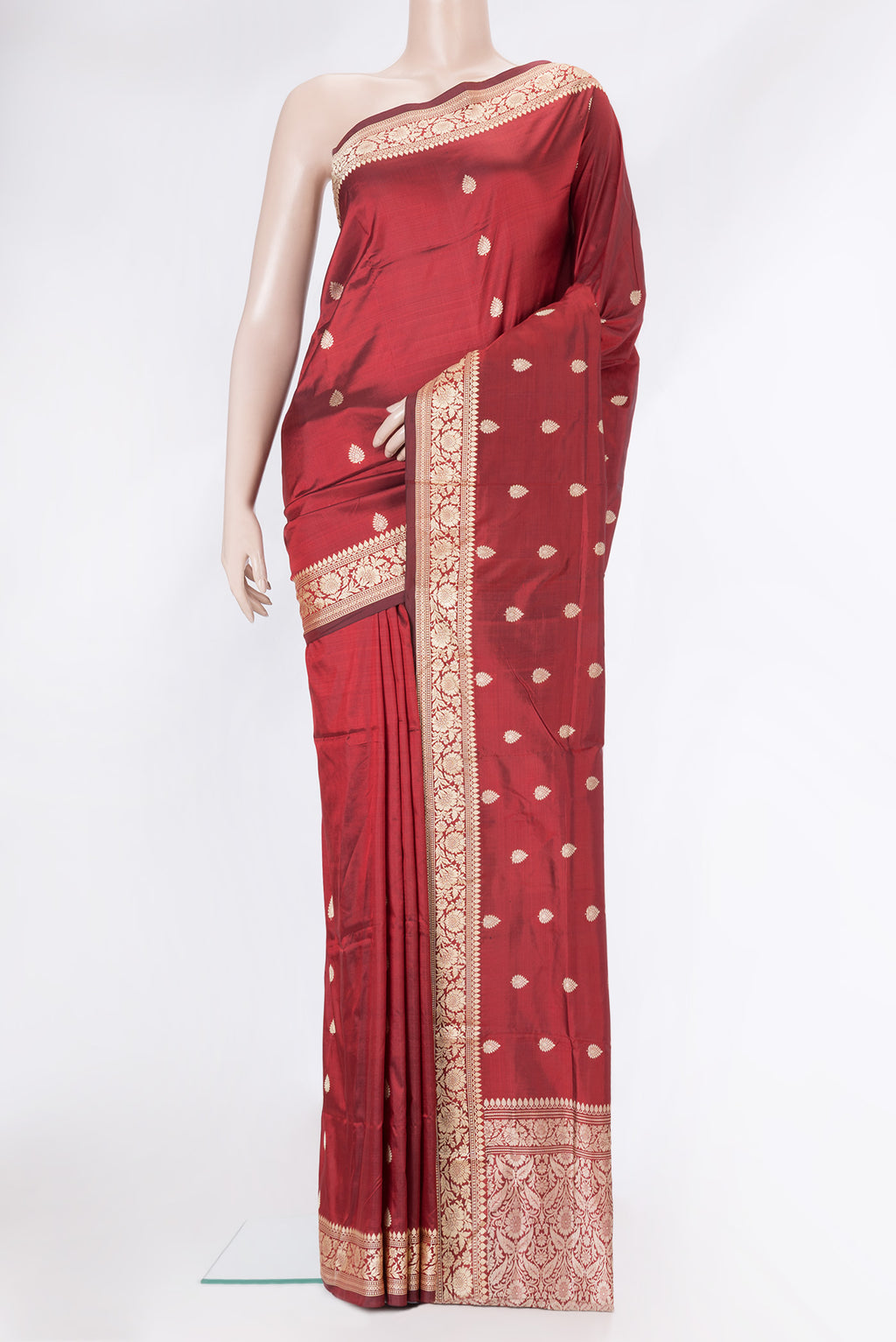 Maroon Dual Tone Banarasi Silk Saree with Thread Butta on the body and Thread Border.  displayed on a mannequin