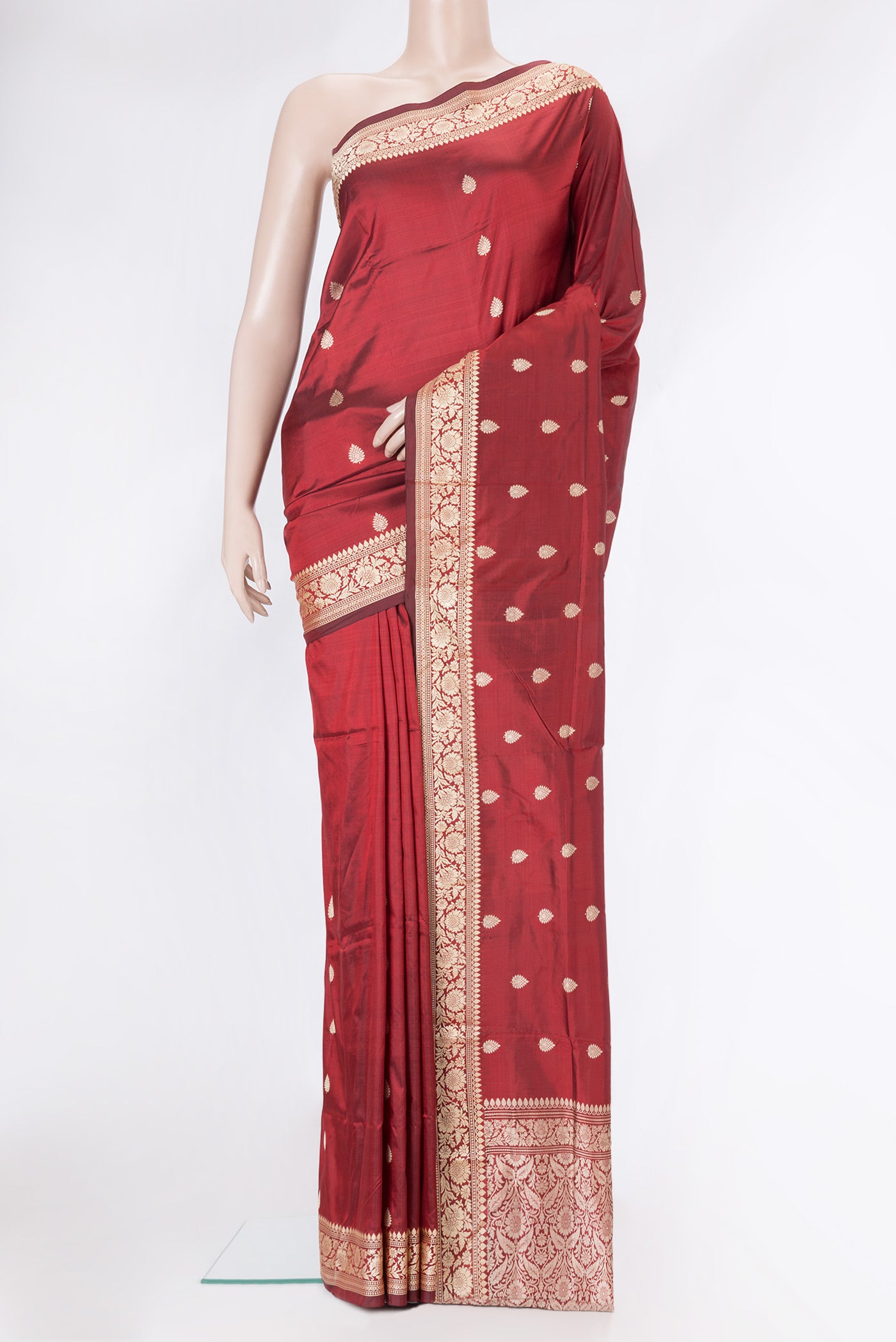 Maroon Dual Tone Banarasi Silk Saree with Thread Butta on the body and Thread Border.  displayed on a mannequin