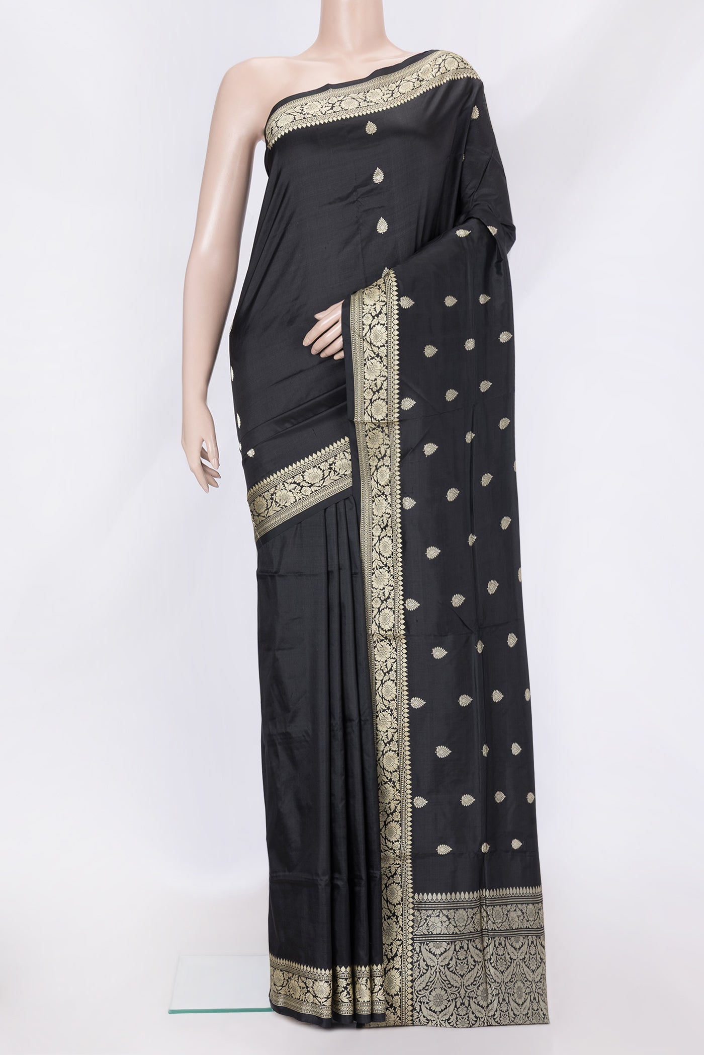 Black Dual Tone Banarasi Silk Saree with Thread Butta on the body and Thread Border.  displayed on a mannequin